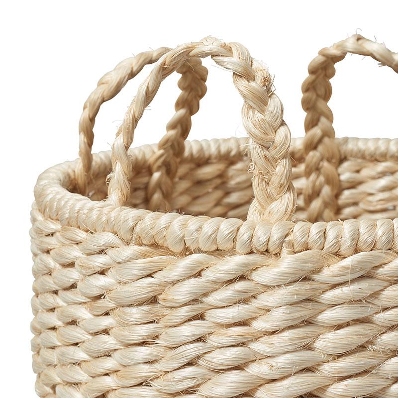 Strikingly textural, our Lubid Black Dipped Abaca Basket beautifully combines form with sturdy durability. Handwoven in the Philippines out of dyed and natural abaca, a tree fiber that’s tough yet surprisingly soft to the touch, this basket’s chunky