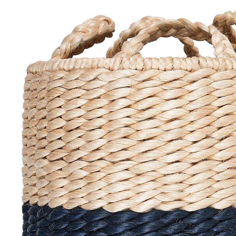 Strikingly textural, our Lubid Blue Dipped Abaca Basket beautifully combines form with sturdy durability. Handwoven in the Philippines out of dyed and natural abaca, a tree fiber that’s tough yet surprisingly soft to the touch, this basket’s chunky