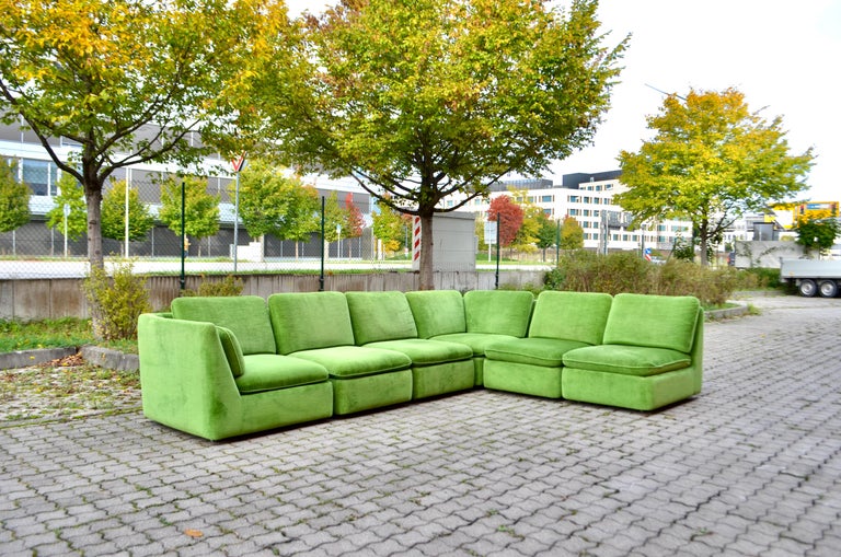 This absolute unique and gorgeous modular sectional sofa from the  70ties is manufactured by  LÜBKE & ROLF  from Rheda in Germany ( later was the Name LÜBKE KG).
From the same family which creates later INTERLÜBKE and  COR.
The frame is made of