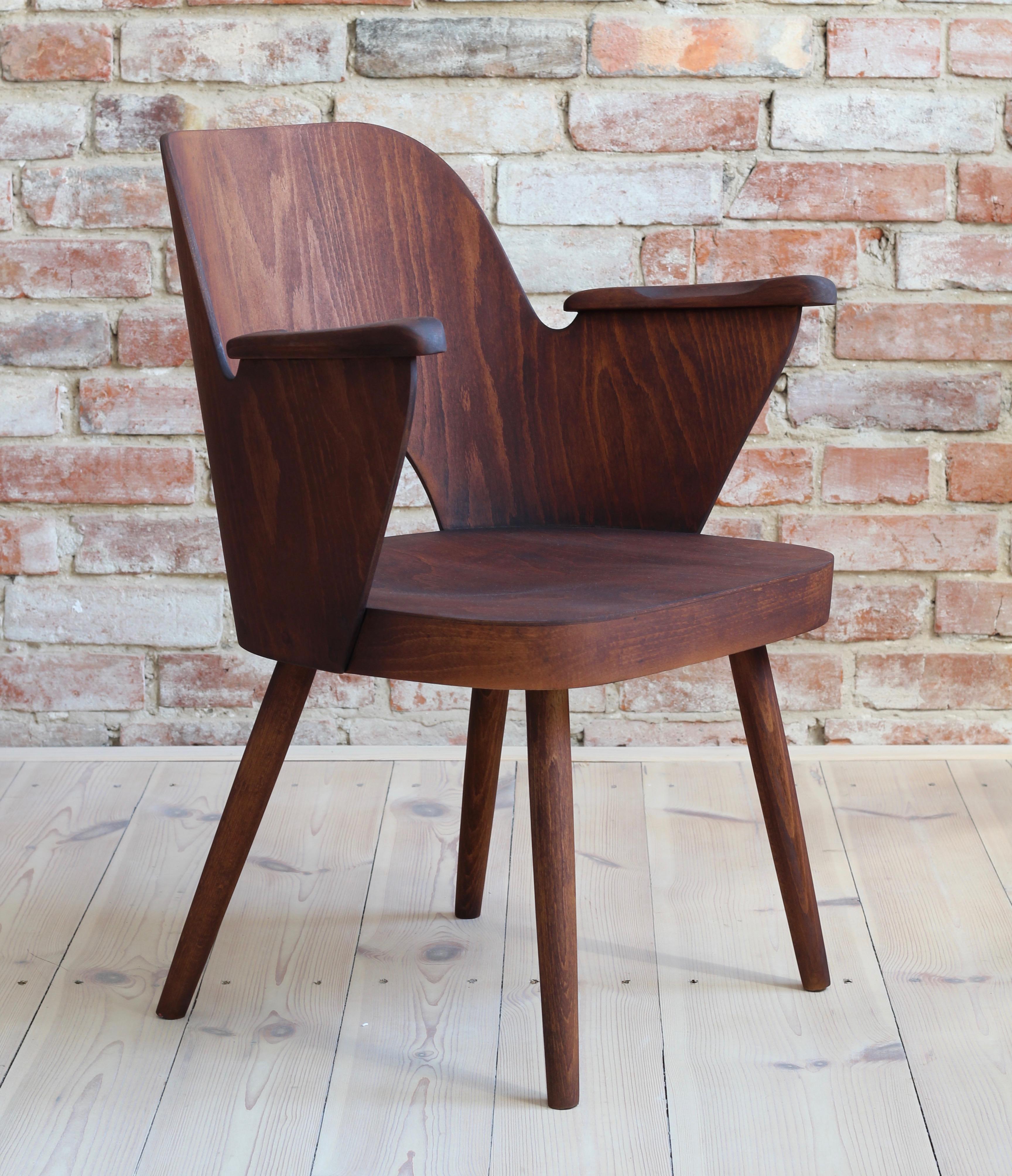 These chairs were designed by Lubomír Hofmann and produced in 1960s by a Czechoslovakian company TON. The chairs are made of beech wood in a unique TON technique of bent plywood. TON (previously Thonet) was a pioneer back in those days in bent