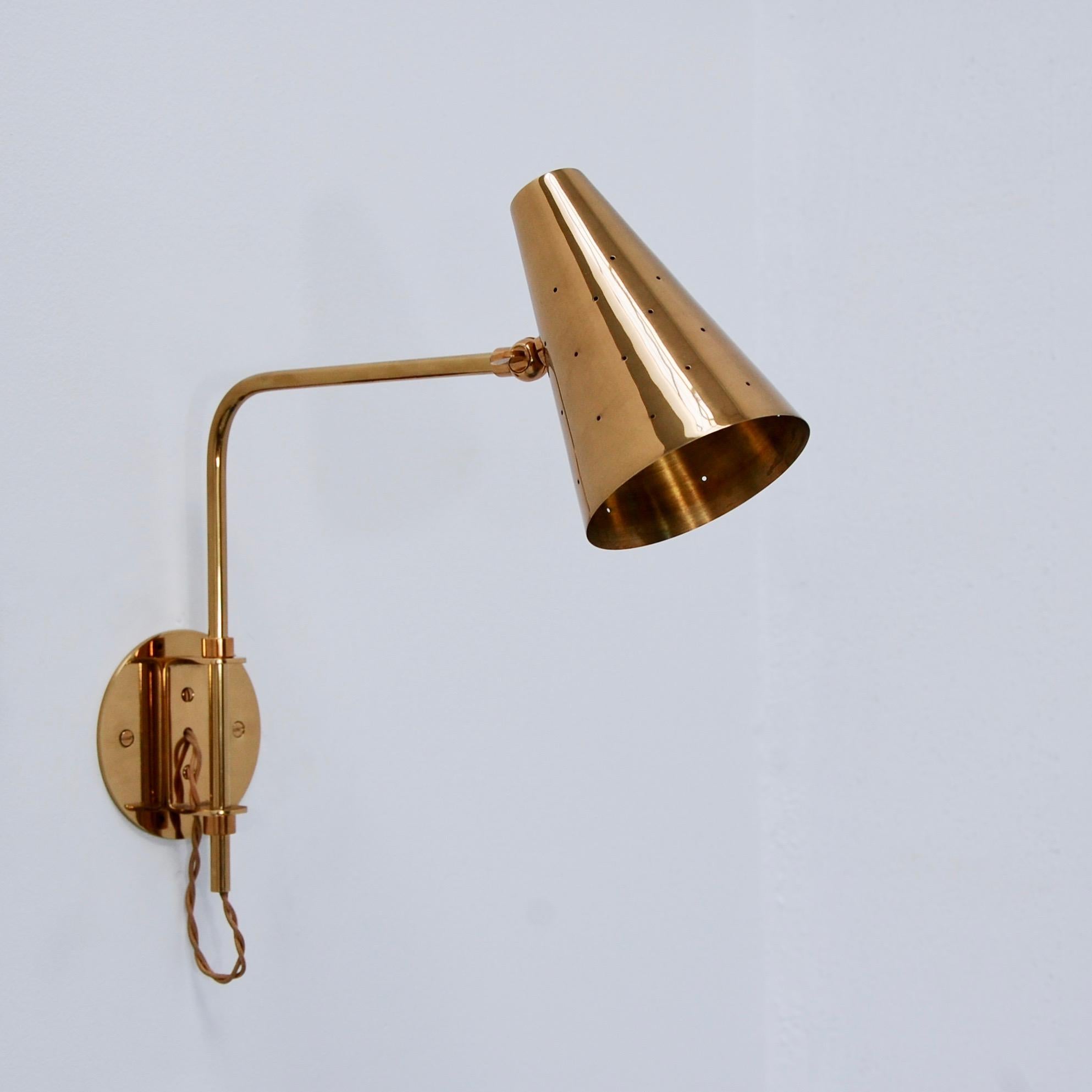 These all brass Lubrary sconces are part of the Lumfardo Luminaires contemporary collection. They can be customized in different dimensions and ordered for hard wired or as plug ins, with a switch either at the cord or at the shade. They can also be