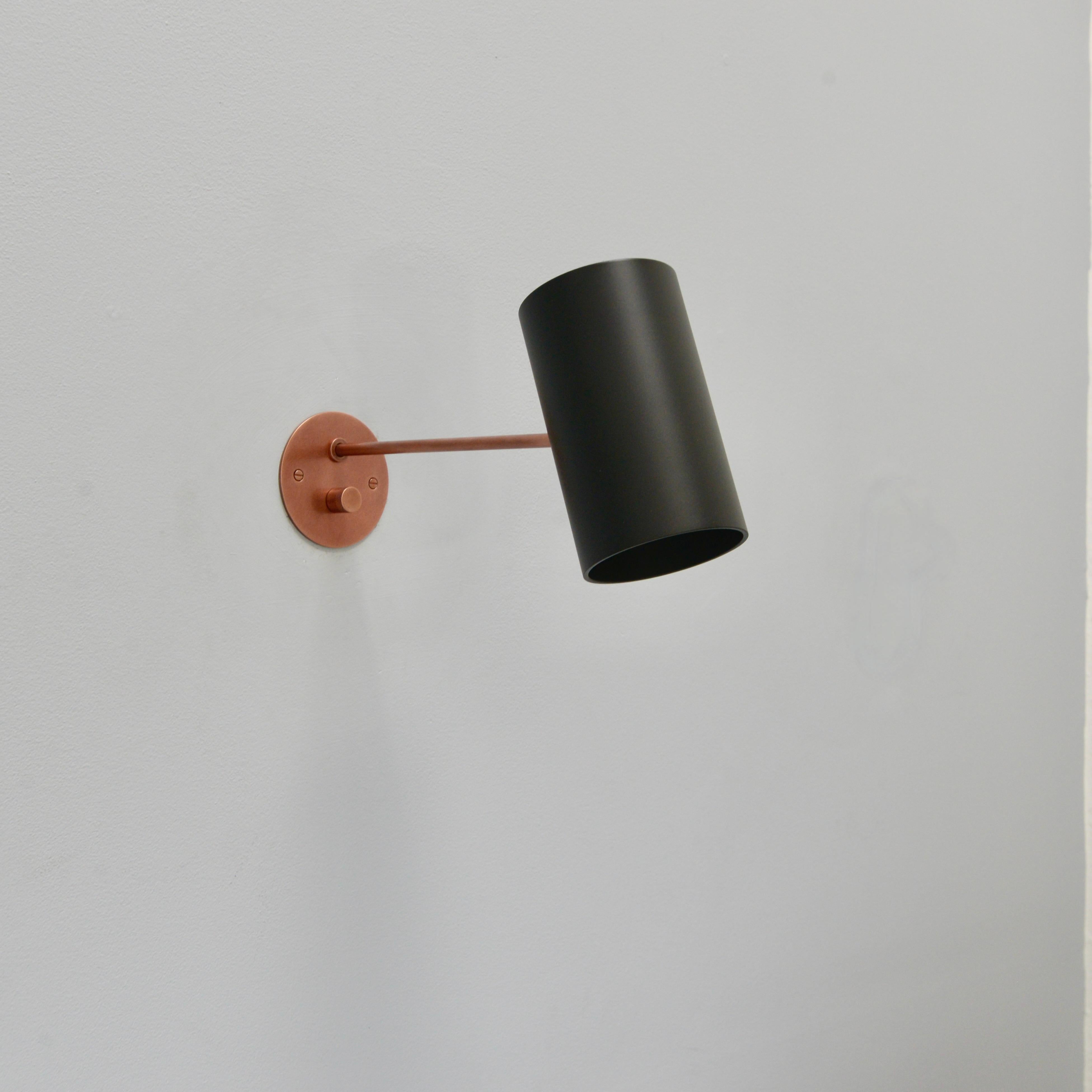 Part of our Lumfardo Luminaries contemporary collection, this LUbular BLK-CP is a copper and black painted aluminum directional reading sconce. Fitted with a turn switch at the 4” backplate. This is a version of our LUbular Sconce that has a longer