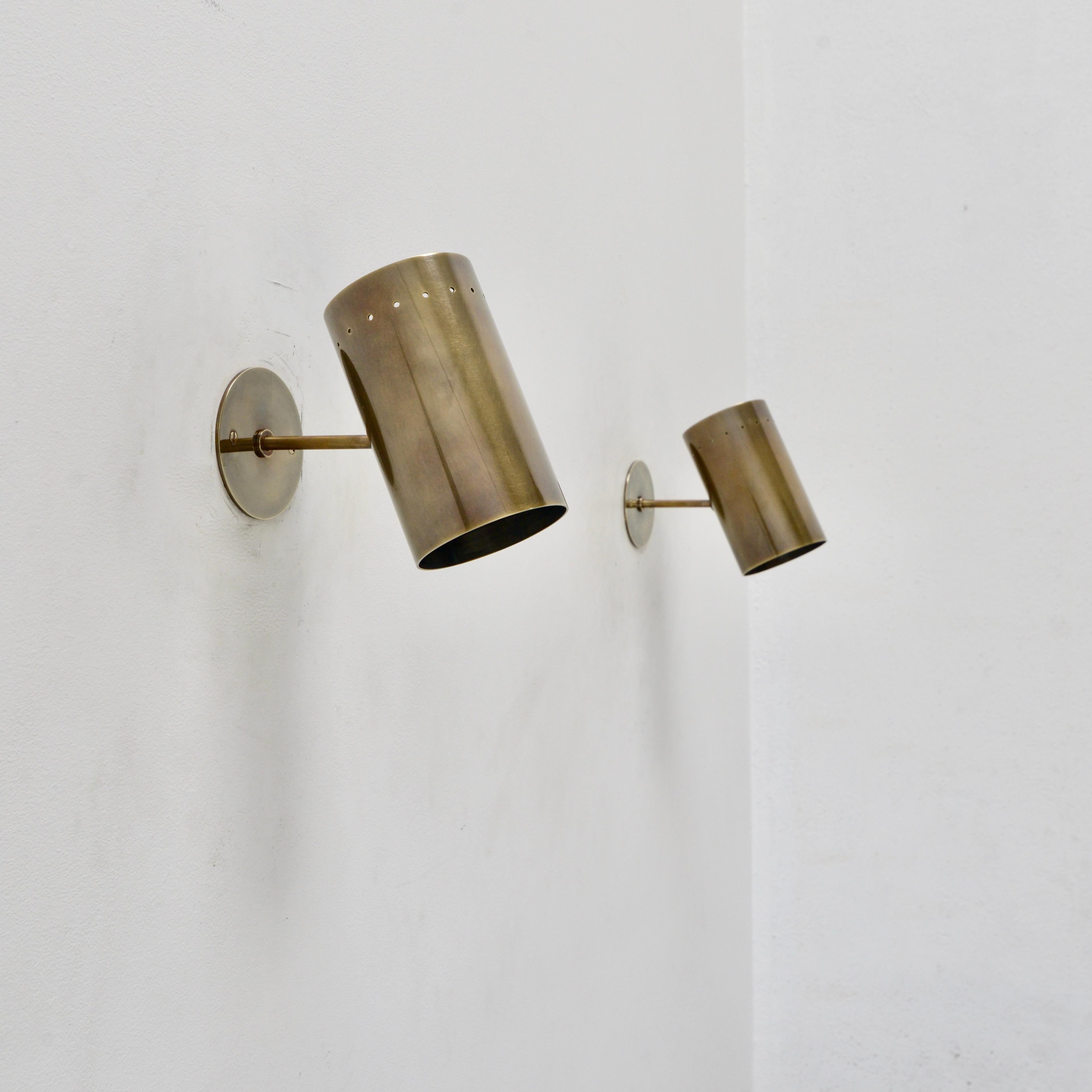 Part of our Lumfardo Luminaires contemporary collection, this LUbular perforated all-brass sconce is a directional reading sconce in a patina brass finish. Single E26 based socket per sconce. Maximum wattage 75 watts per sconce. 4” Back plate has 2