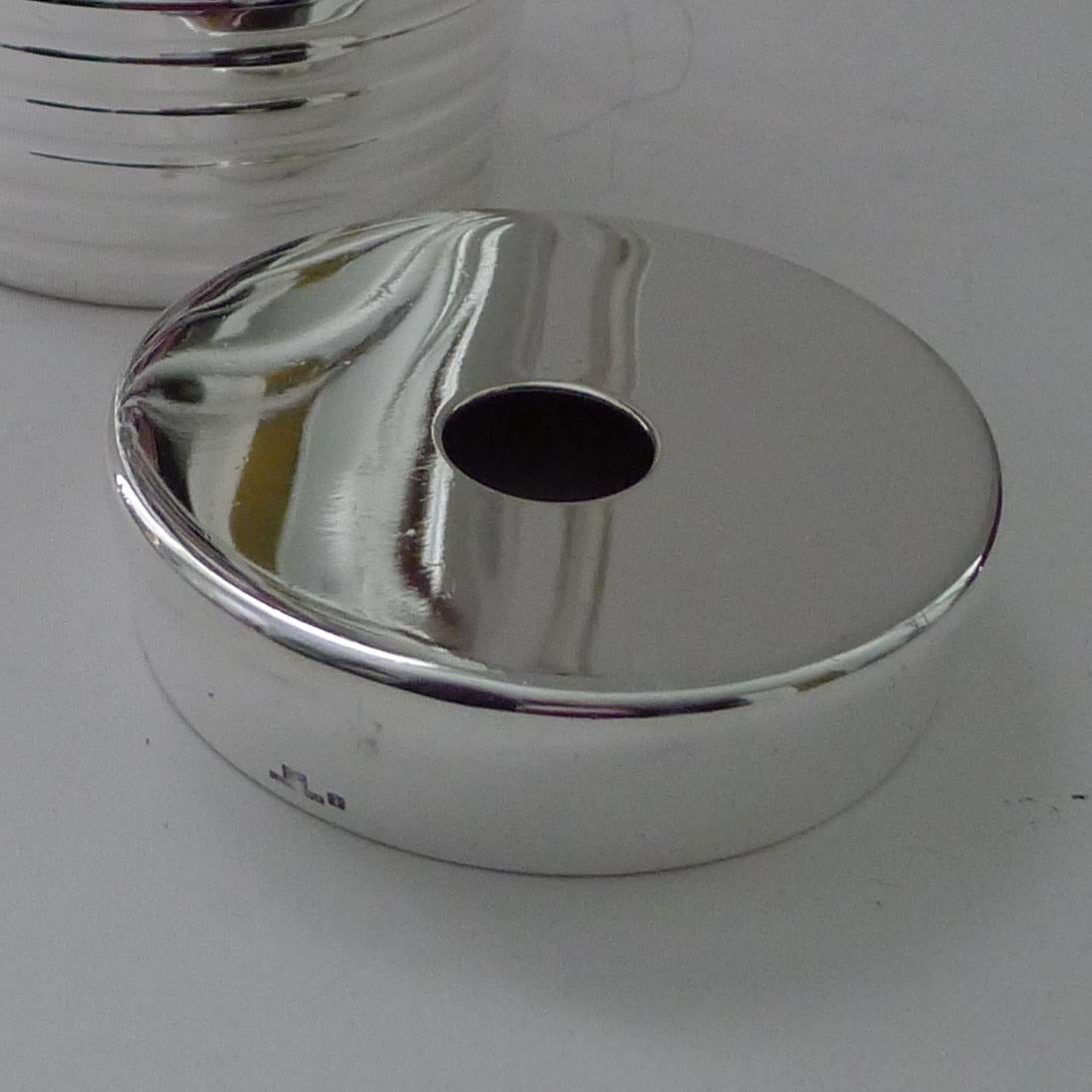 A stylish vintage French ice bucket or pail in silver plate, designed by Luc Lanel in 1932 for Maison Christofle of Paris.

It's simple Art Deco design with ribbed decoration around the body and ribbed swing handle is as fashionable in 2021 than it