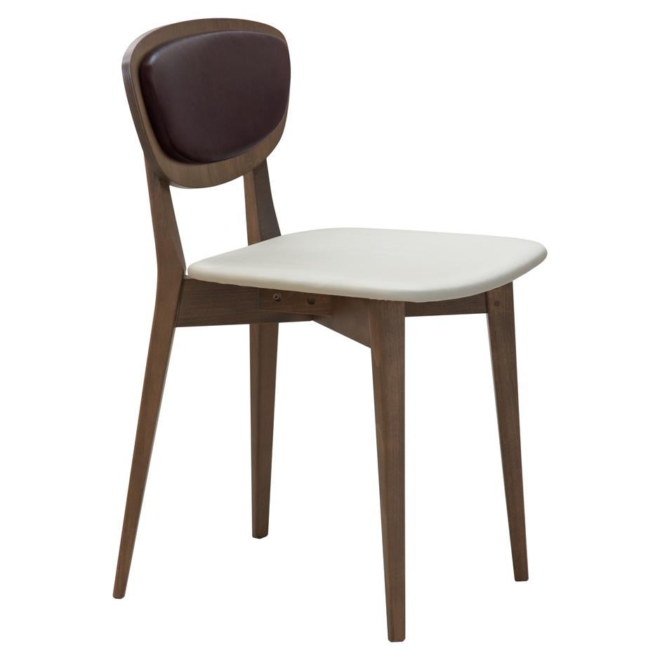Dovain Studio presents you the Luc chair that is entirely manufactured in wood and has a soft seat composed with foam and fabric that can be chosen with a variety of colors and textures. 
Comfort and durability are the goals for this Lima chair, a