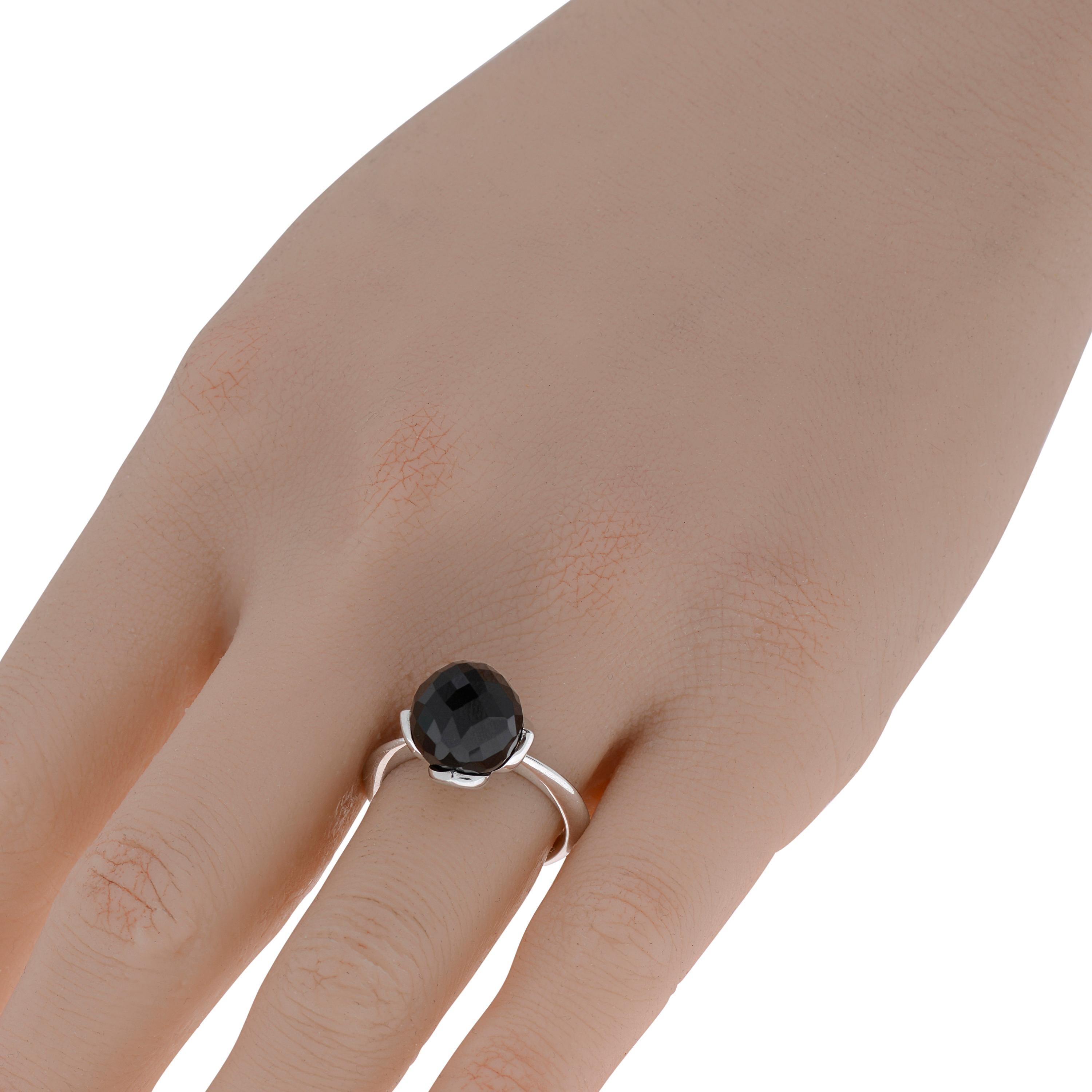 This adventurous Luca Carati 18K White Gold Band Ring features a striking Onyx berry and smooth 18K gold. The ring size is 7 (54.4). The Decoration Size is 12.5mm x 13mm. The Weight is 6.5g.
