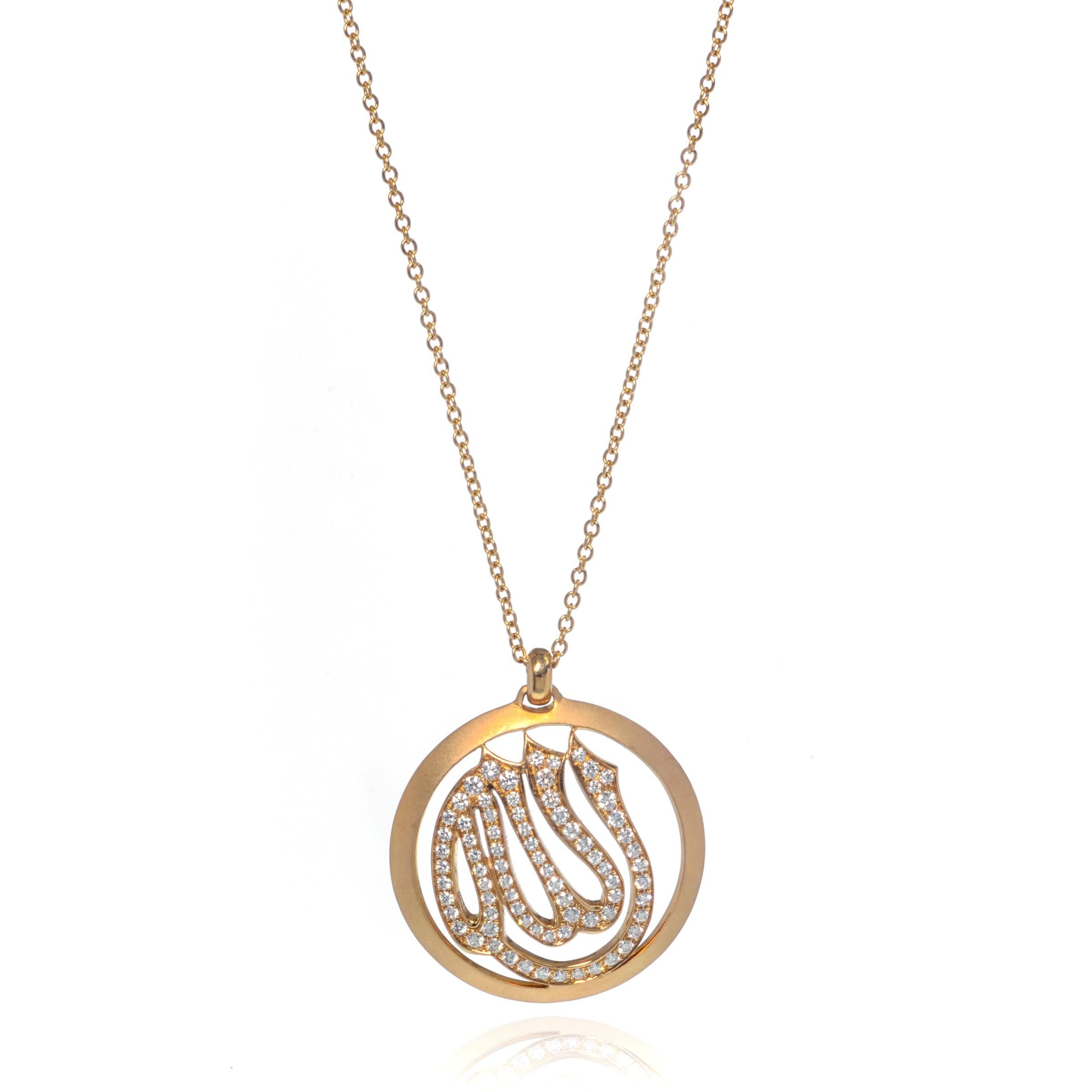 This 18k yellow gold pendant necklace features brilliant diamonds 0.95cttw, with a beautiful satin yellow gold Arabic symbol for Allah. The pendant is on a delicate 18k yellow gold chain. Total carat weight: 0.95. Diamond color G and VVS clarity.