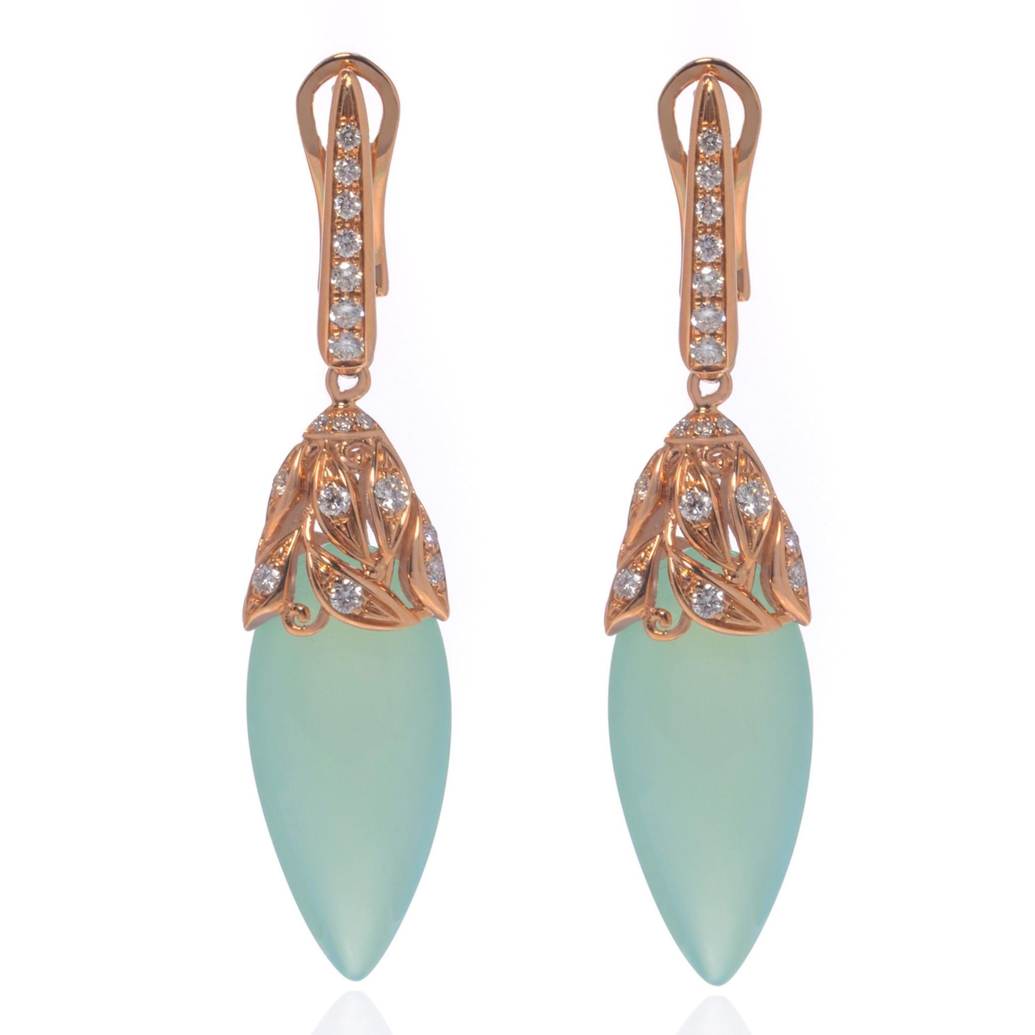 Chalcedony and diamond drop earrings of classic contemporary styling. The earrings are crafted in 18k yellow gold and set with a combination of Chalcedony and round brilliant cut diamonds. Diamonds are pave set and have a total weight of 0.45.