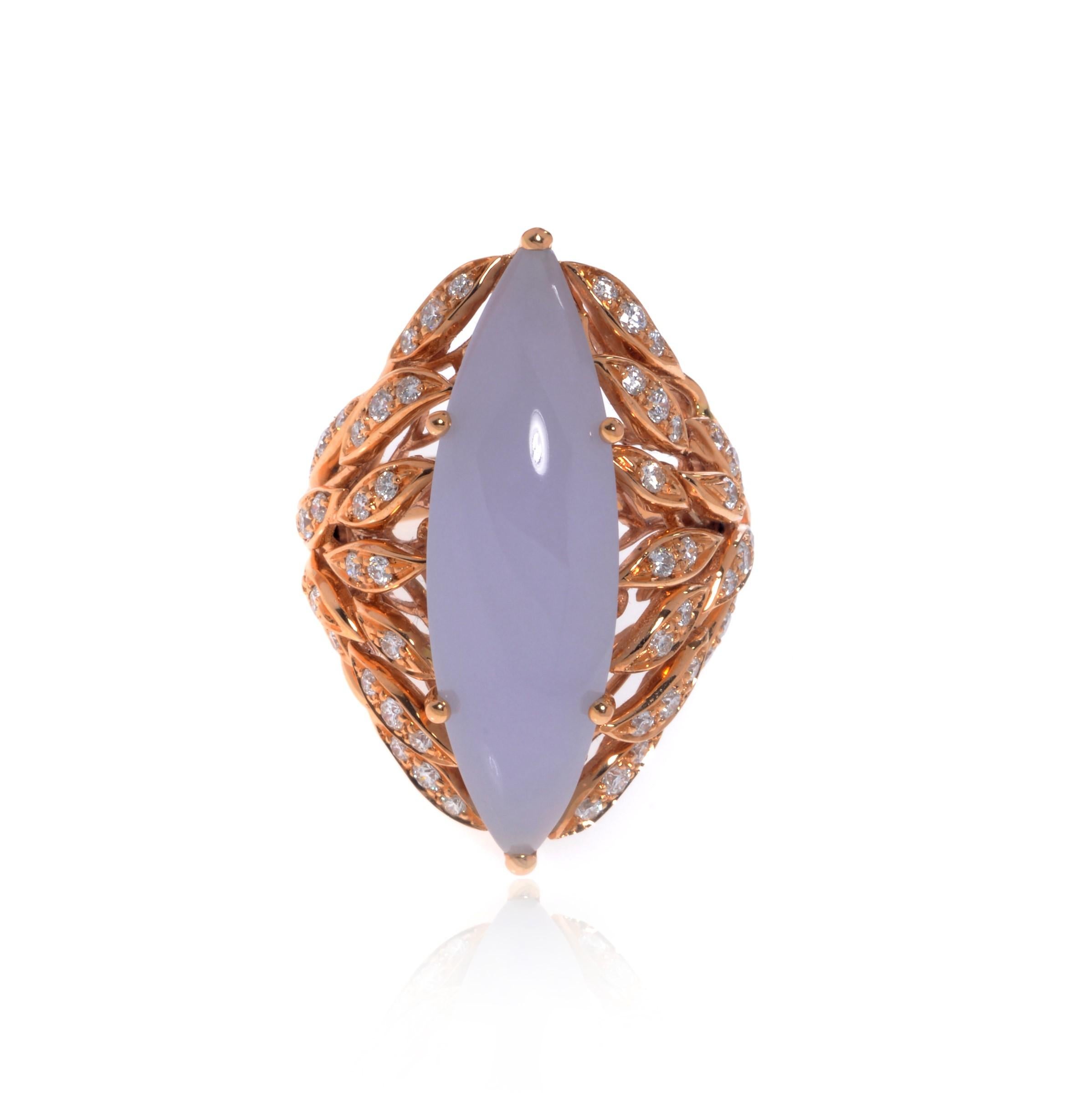 This beautiful cocktail ring features a large natural marquise shape Chalcedony in 18k rose gold. Set with 0.78cttw of brilliant cut diamonds. Diamond color G and VVS clarity. Chalcedony weights 2.40 grams. Ring size 6.5. Top measurements: 32.00mm.
