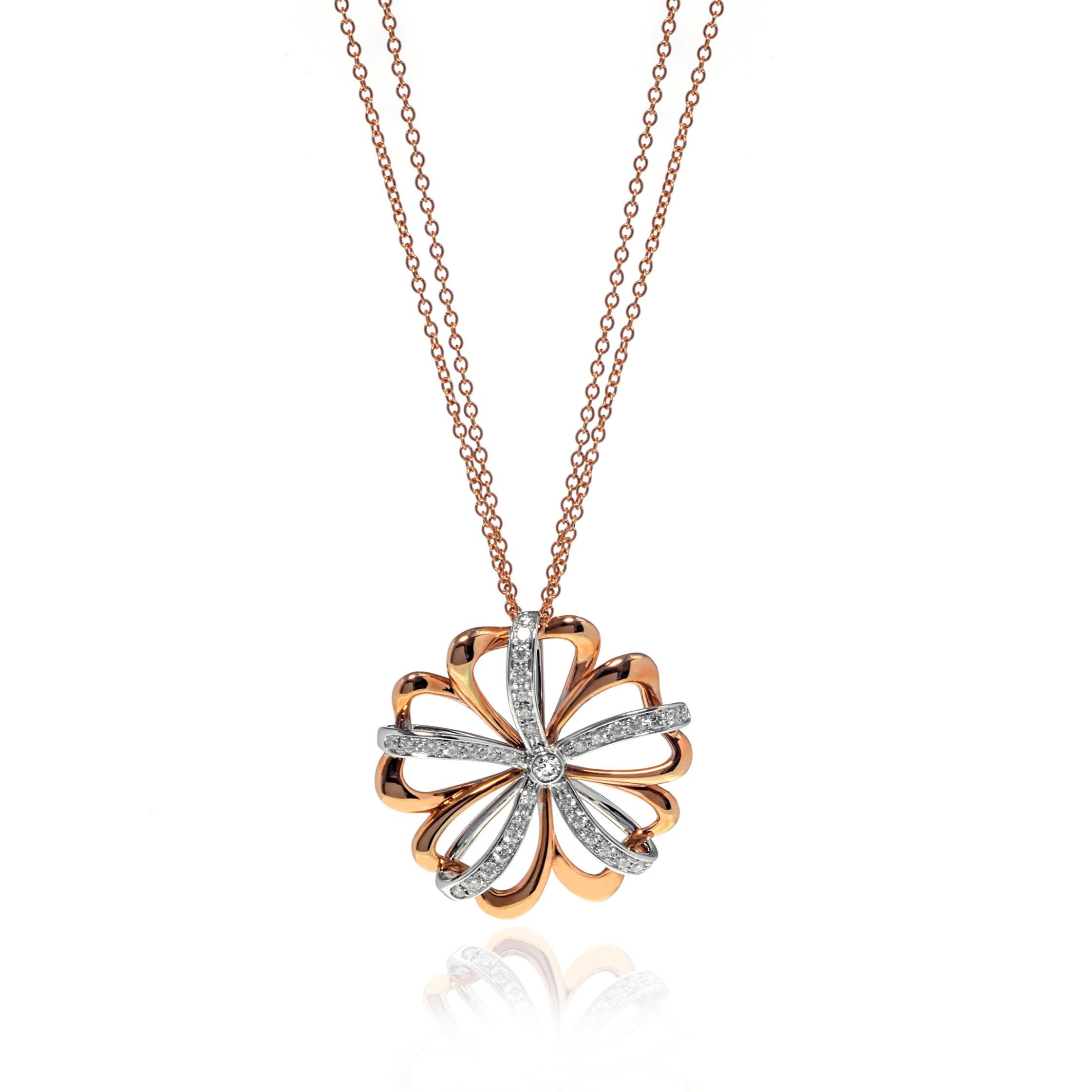 Beautiful Luca Carati diamond flower pendant necklace crafted in 18k rose gold and white gold. This necklace features a gorgeous display of brilliant round cut pave set diamonds weighing 0.87Cttw. Diamond color G and VVS-VS clarity. Chain length: 30