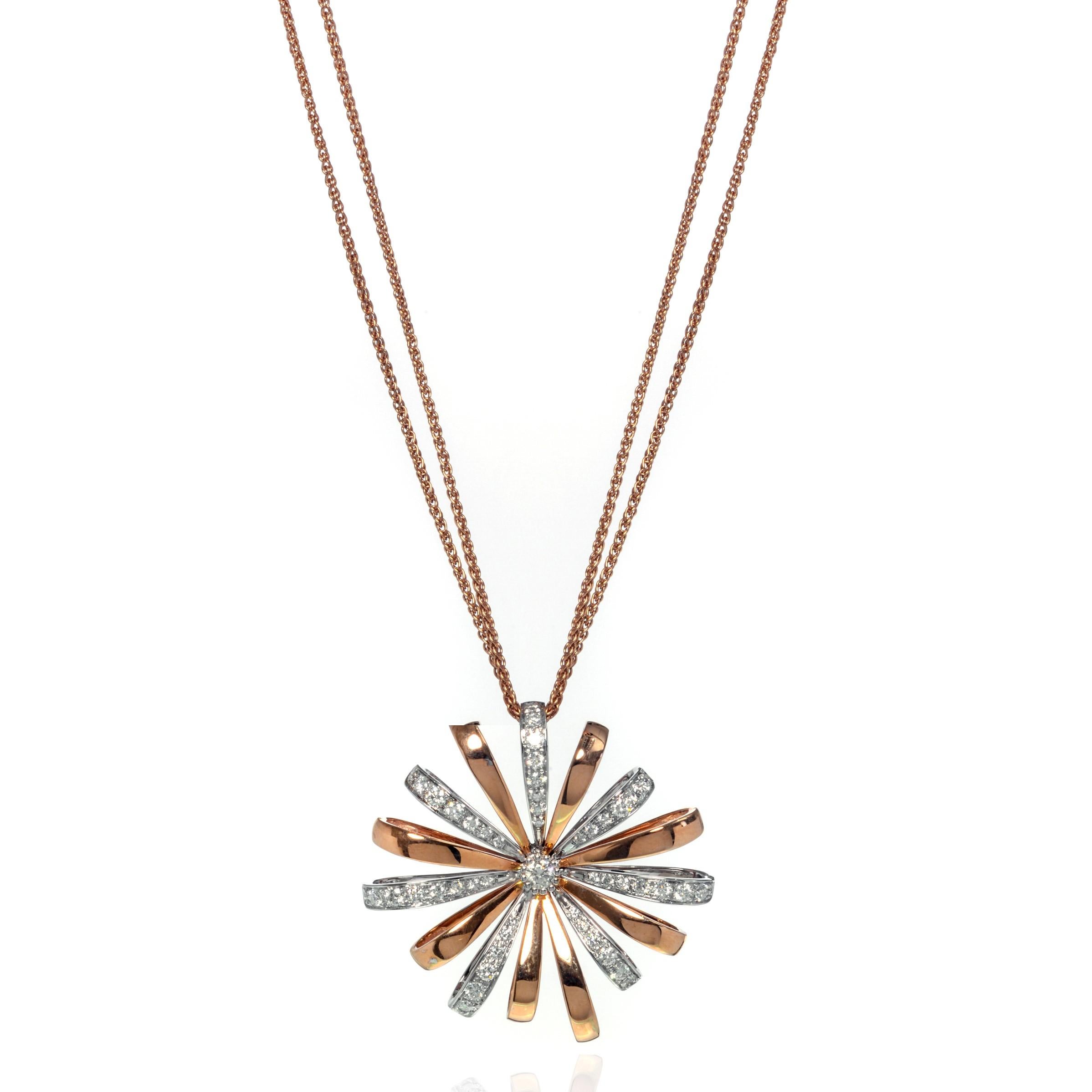 Beautiful Luca Carati large diamond flower pendant long necklace crafted in 18k rose and white gold. This piece features a gorgeous display of brilliant pave set diamonds weighing 1.28cts. Diamond color G and VVS-VS clarity. Chain length: 30 inches.