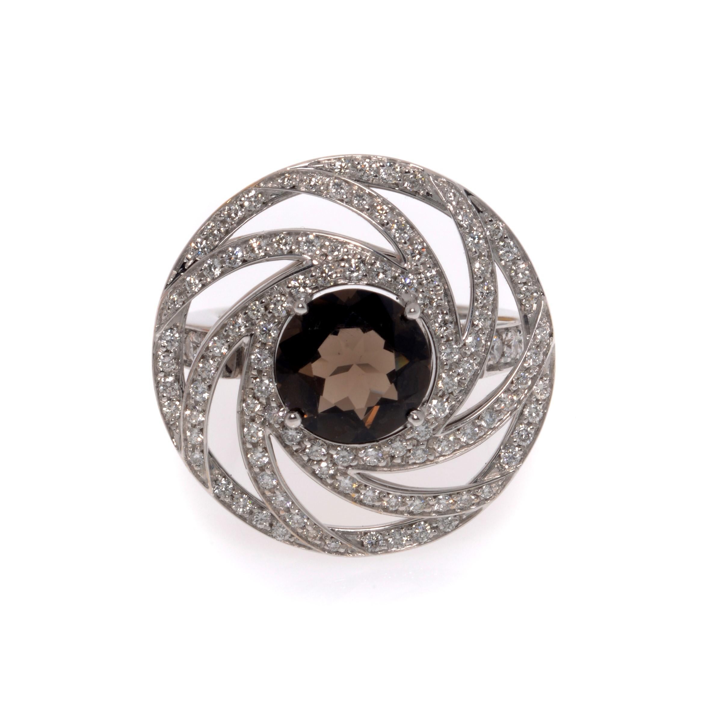 Luca Carati smoky quartz & diamond cocktail ring crafted in 18k white gold. Creating a look that's undeniably glamorous. It features a prong set round cut smoky quartz weighing: 0.50ct. with pave set round cut diamonds weighing 1.18cts. Diamond