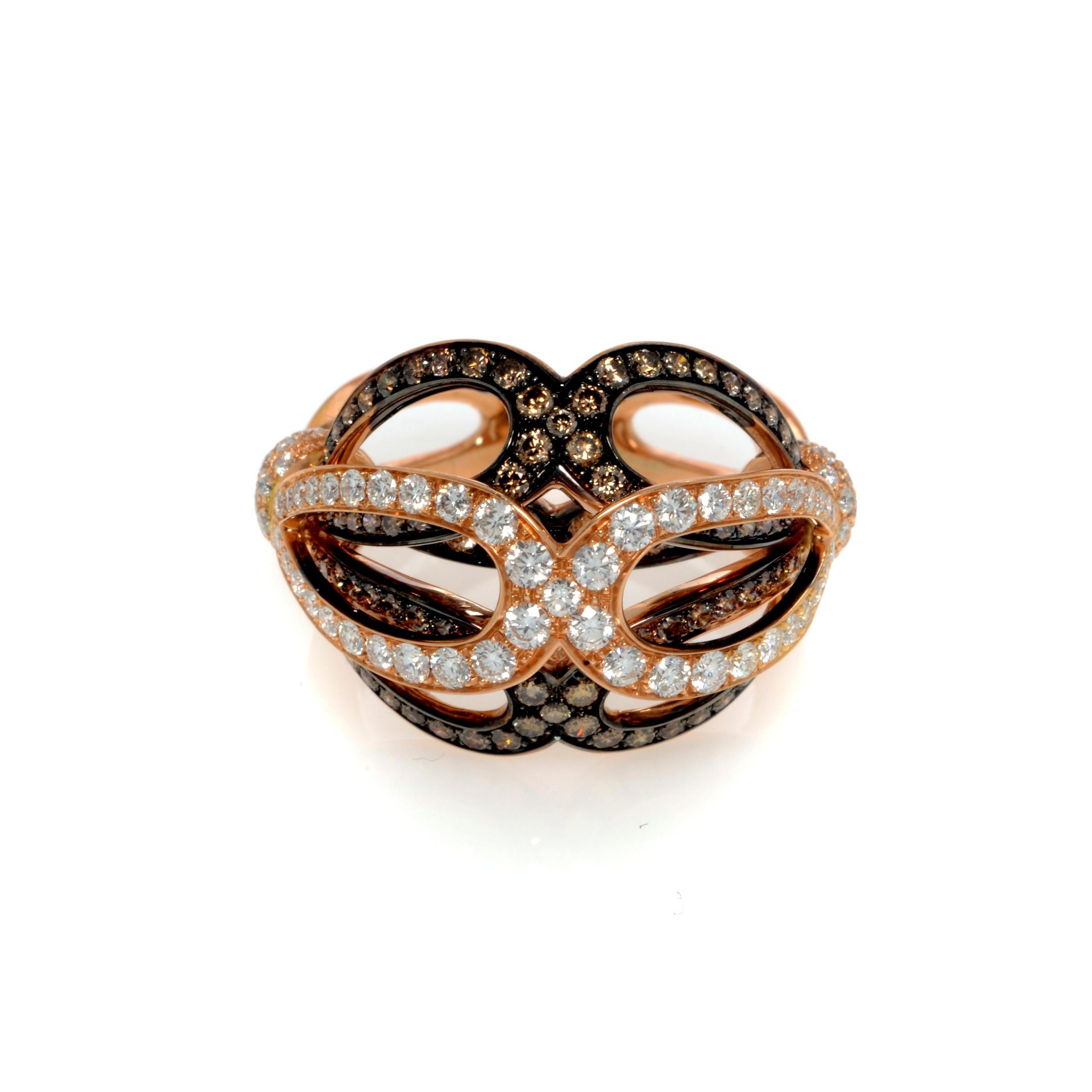 18k yellow gold, black rhodium, white and brown diamond cluster cocktail ring. This ring is pave set with 1.97cttw of brilliant cut white diamonds. Diamond color G and VVS clarity. Also set with round cut natural brown diamonds totaling 0.92cttw.
