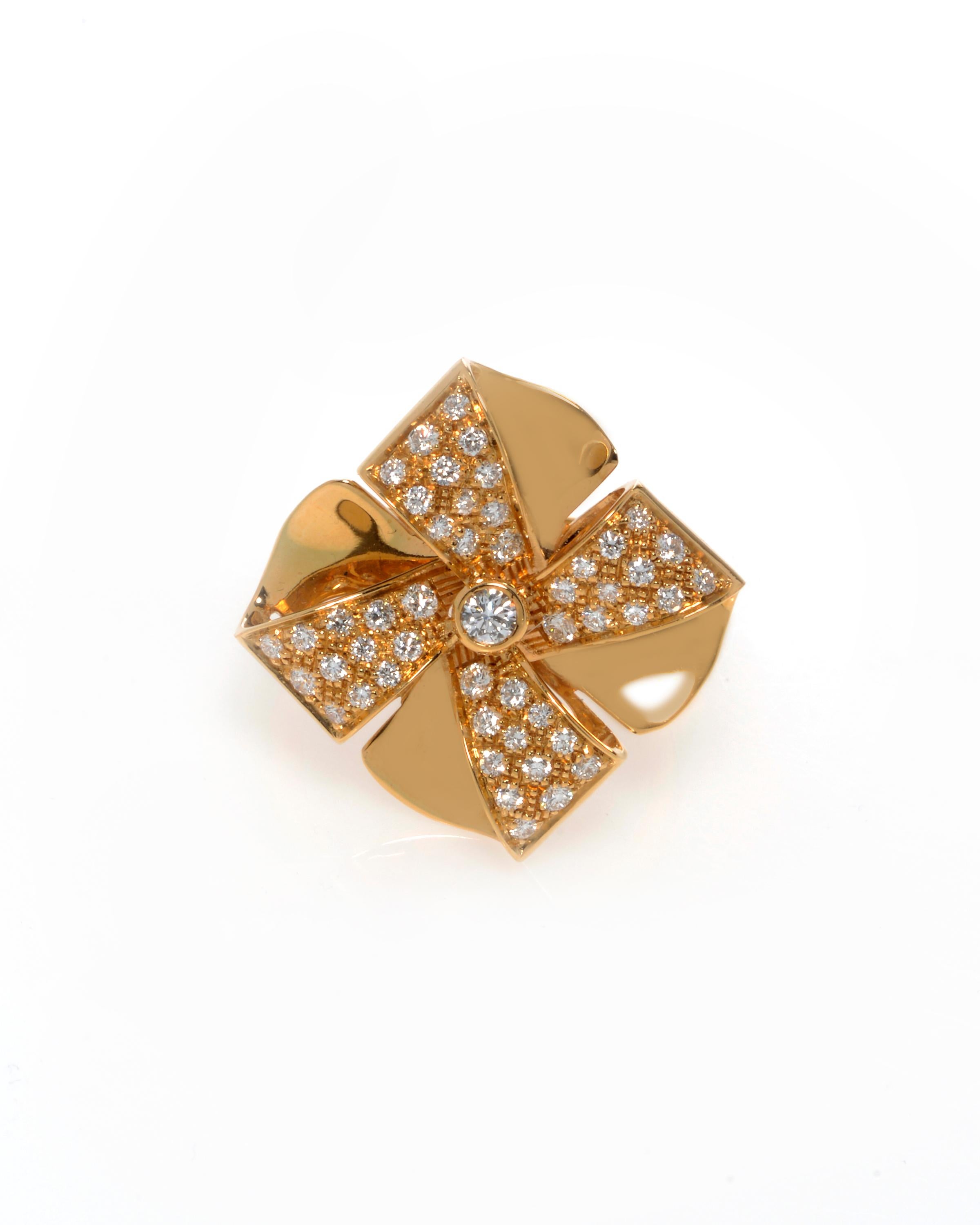 Luca Carati 18K Yellow Gold Diamond Flower Cocktail Ring. The ring is set with 0.71cttw of round cut diamonds. Diamond color G and VVS clarity. Ring size 7.5. Weight: 9.20 grams. Comes with a box and a certificate. 