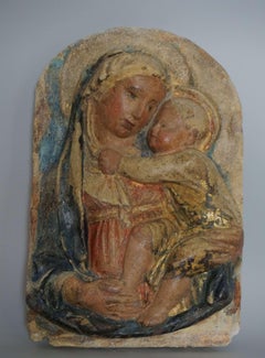 Madonna mit Kind, Relief aus polychromem Stuck, Werkstatt von Luca della Robbia.