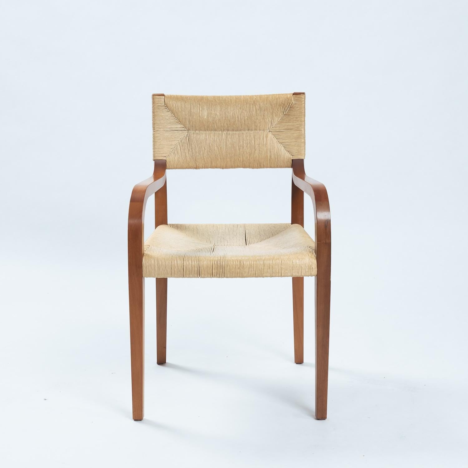 Luca Meda Risiedo rope walnut dining chairs by for Molteni, Italy 1980s

This beautiful set of 4 chairs was designed by Luca Meda in 1988 for Molteni Italy.
It is called Risiedo and is a chair with armrests and as such it has a greater sense of