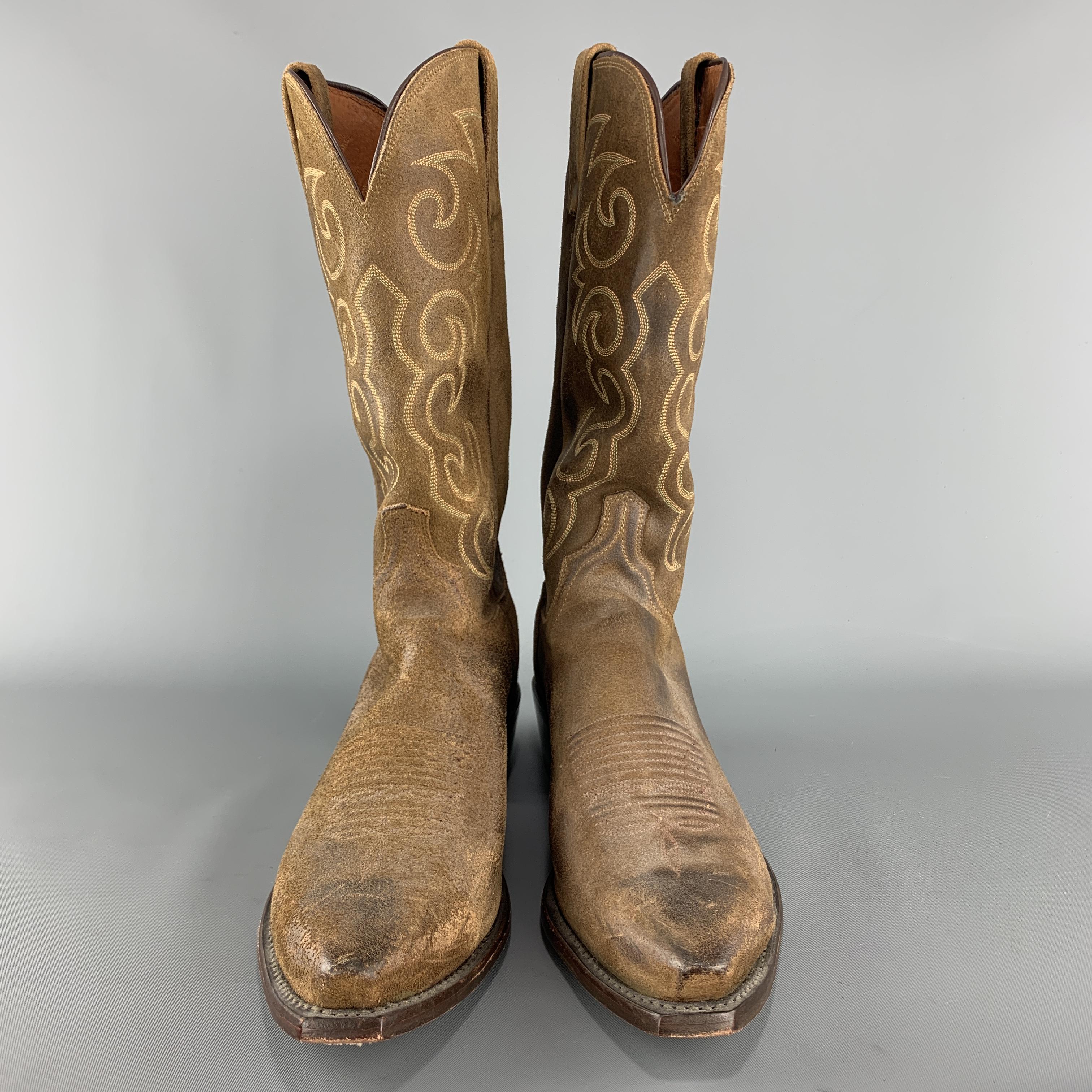 1883 by LUCCHESE cownbow boots come in tan suede with a pointed toe and embroidery.  Made in USA.

Good Pre-Owned Condition.
Marked: US 10.5

Outsole: 12.5 x 4 in.
Length: 13 in.