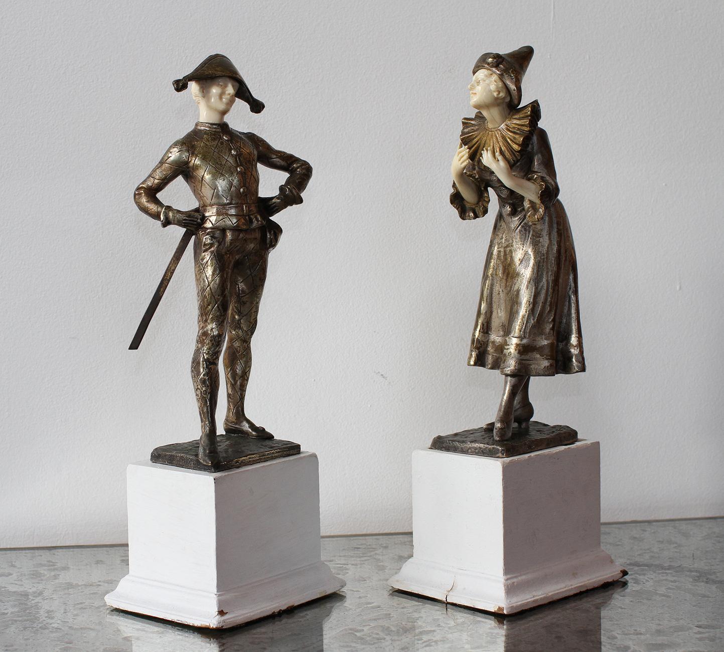 LUCE

Beautiful and very glamour pair of 1920 sculptures depicting Harlequin & Columbine,
France, 1920
The bronze has a beautiful original silver and gold patina and the bone carving is very delicate, principally in the Columbine fingers and both