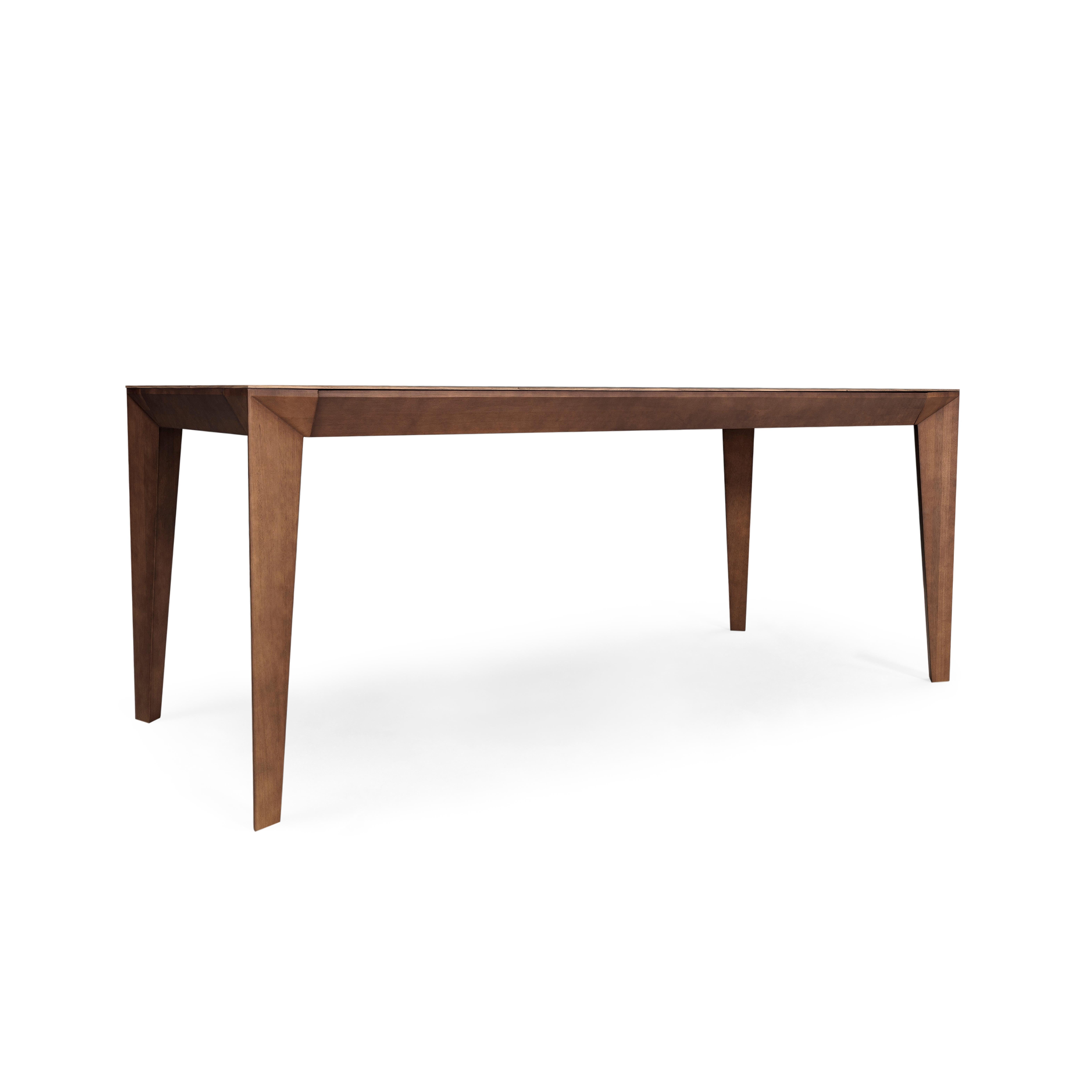 The Luce dining table was made by the Uultis team to bring together simplicity, elegance, and beauty. Using beautiful walnut veneered wood, along with subtle design features such as stunning angular legs. Combining all these details the amazing