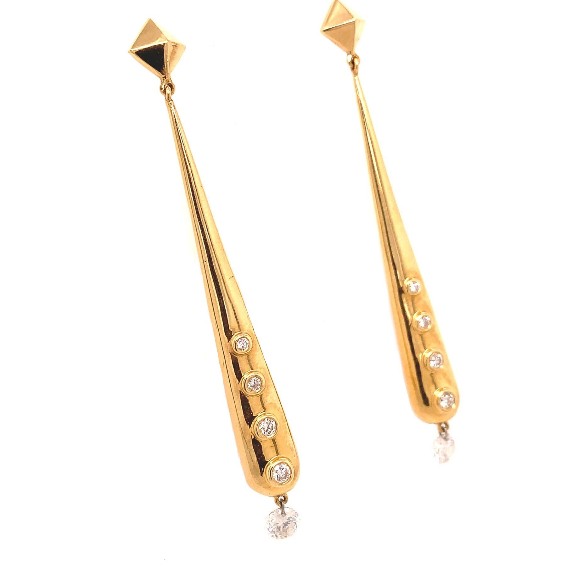 Dangling Diamond Collection,

In this collection Lucea releases their Diamonds from 18K gold to allow the maximum amount of brilliance of the Diamond by piercing them with a platinum ring letting them dangle freely.

Diamond; 0.68ct total