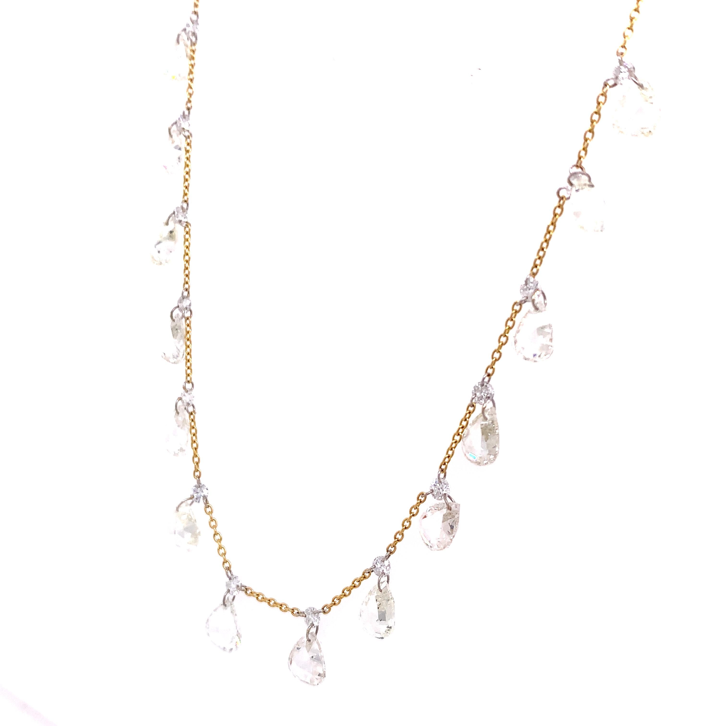 The elegant grace of an adjustable Yellow Gold chain combined with a dazzling fringe of 30 brilliant Rose Cut Diamonds in this eye-catching necklace.

