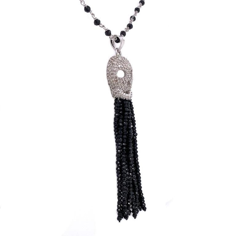 Rustic Collection

White Diamond skull with black Spinel tassels on 