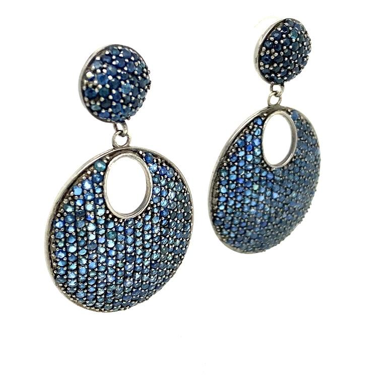 Life In Color Collection

Blue Sapphire drop earrings set in blackened sterling silver.

Blue sapphire: 15.40ct total weight.
