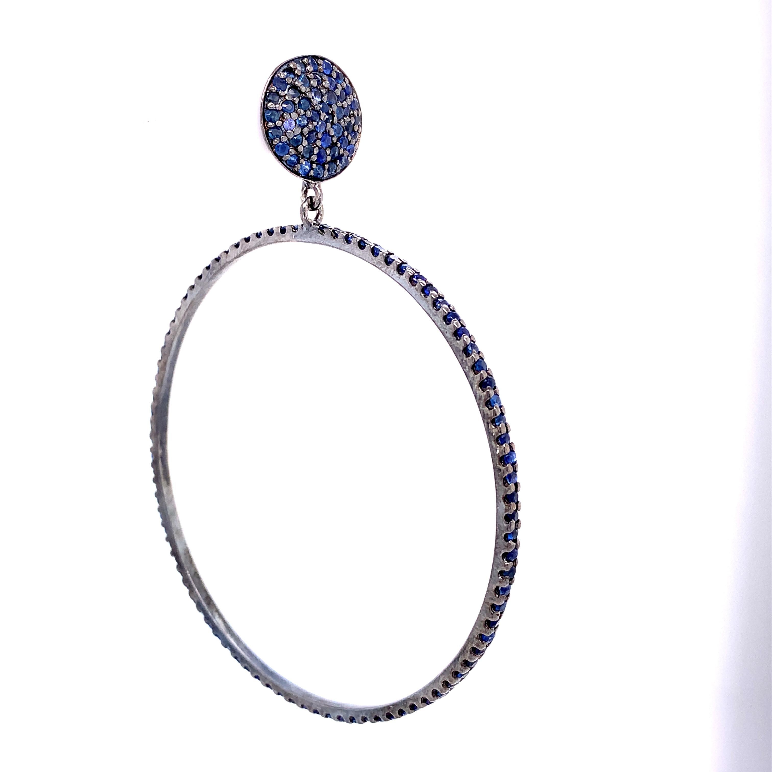 Life In Color Collection  

Blue Sapphire hoop earrings with disc studs set in blackened sterling silver. 

Blue Sapphire: 3.56ct total weight.