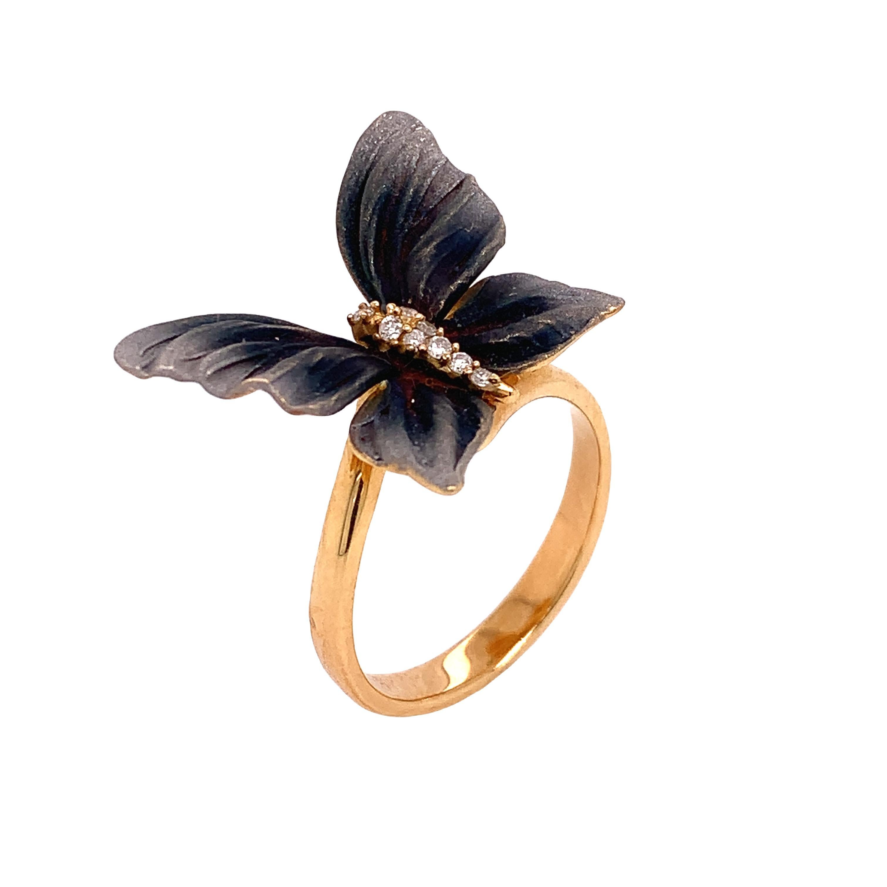 Gray-Brown Collection

Butterfly tainted gray rhodium ring with Diamonds set in 18K yellow gold.

Diamond: 0.05ct total weight.
All diamonds are G-H/ SI stones.
