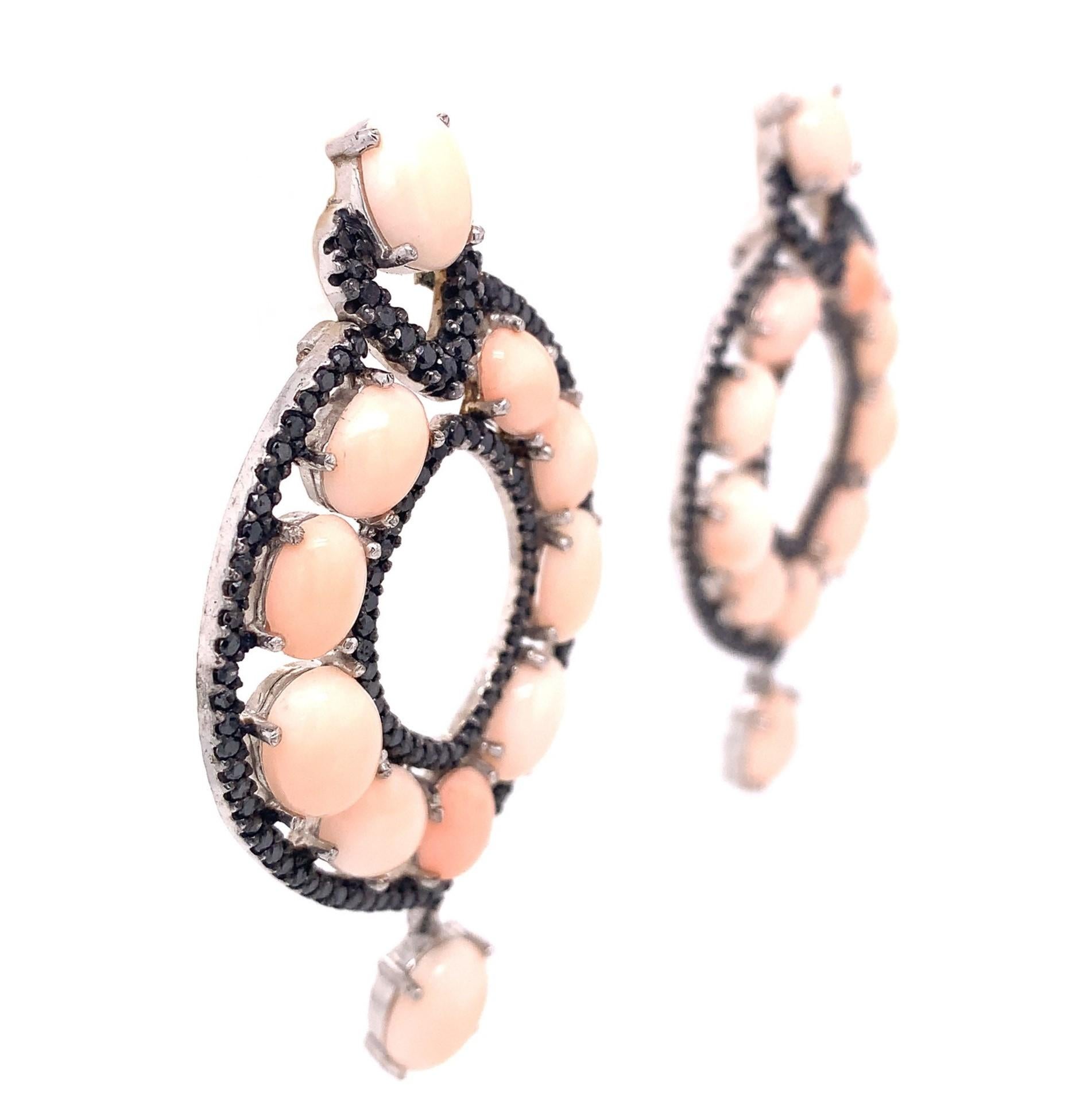 Life in color Collection

Amazing statement earring in bright fun Coral and Black Diamond. Set in Sterling Silver.

Coral: 53.92ct total weight.
Diamond: 5.69ct total weight.