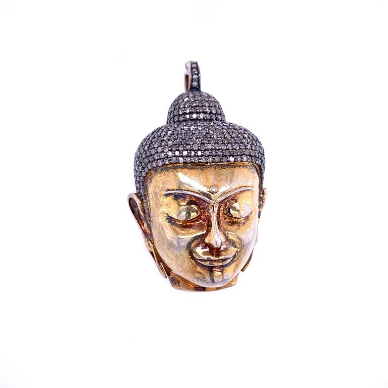 Rustic Collection

Let out your spiritual side with a rustic Diamond Buddha head pendant set in sterling silver and 14K gold plating. 
