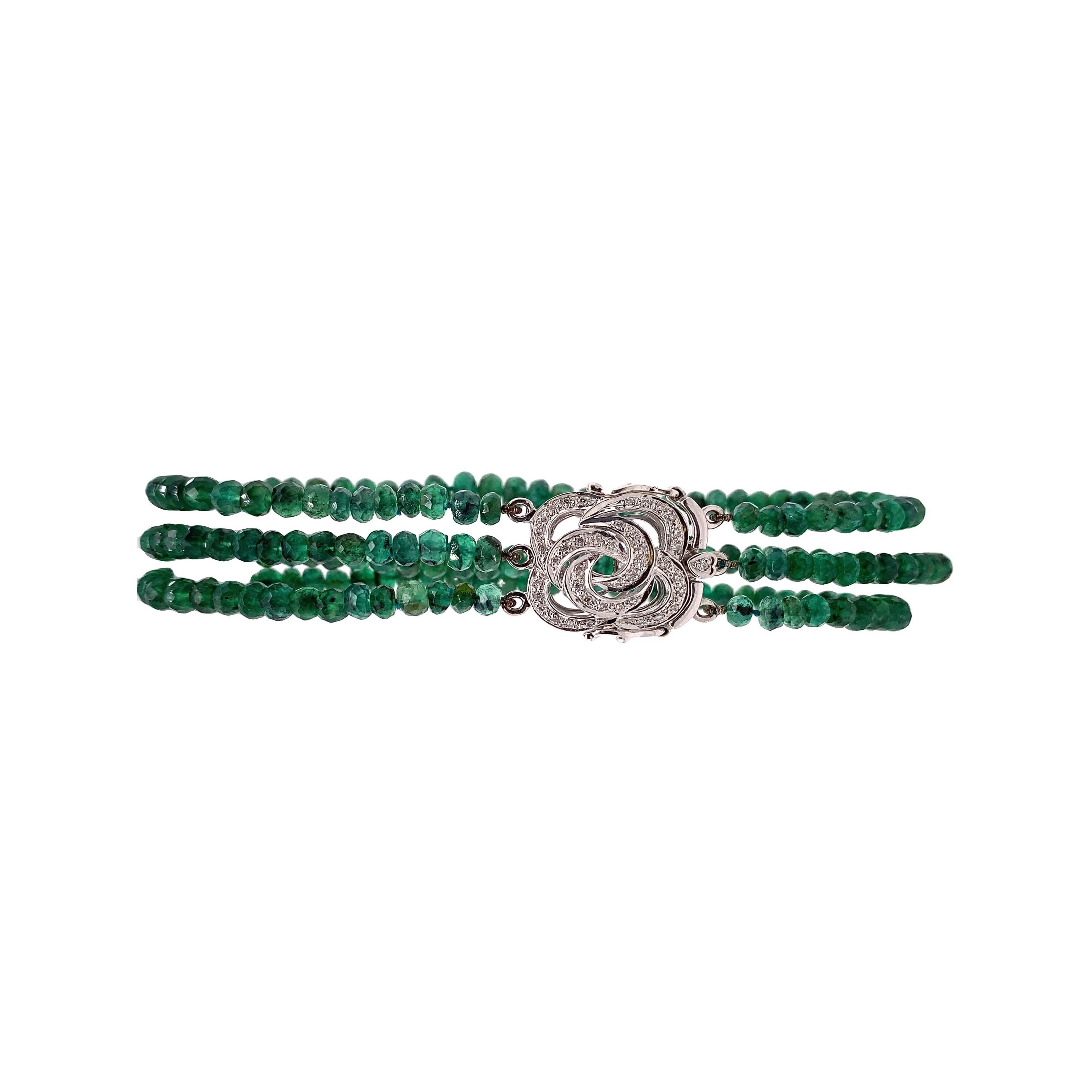 Life in color collection

This emerald beaded and diamond bracelet is a timeless treasure. The three rows of emerald beads are woven together with a flower shape diamond lock clasp for a secure fit. Diamond lock is made of 18K White Gold.

Emerald: