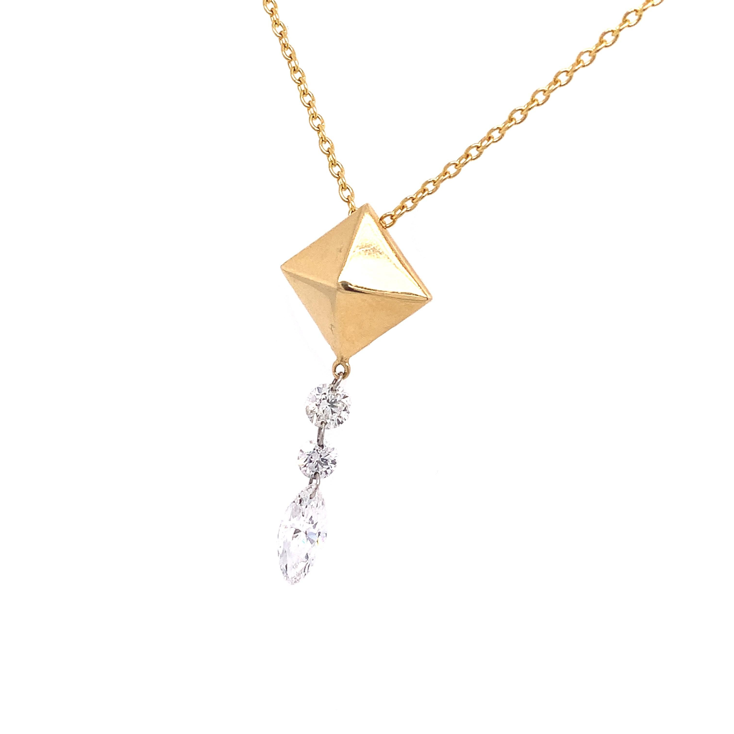 Dangling Diamond Collection,

In this collection Lucea releases their Diamonds  to allow the maximum amount of brilliance of the Diamond by piercing them with a platinum ring letting them dangle freely. This 18K gold piece is attached to an