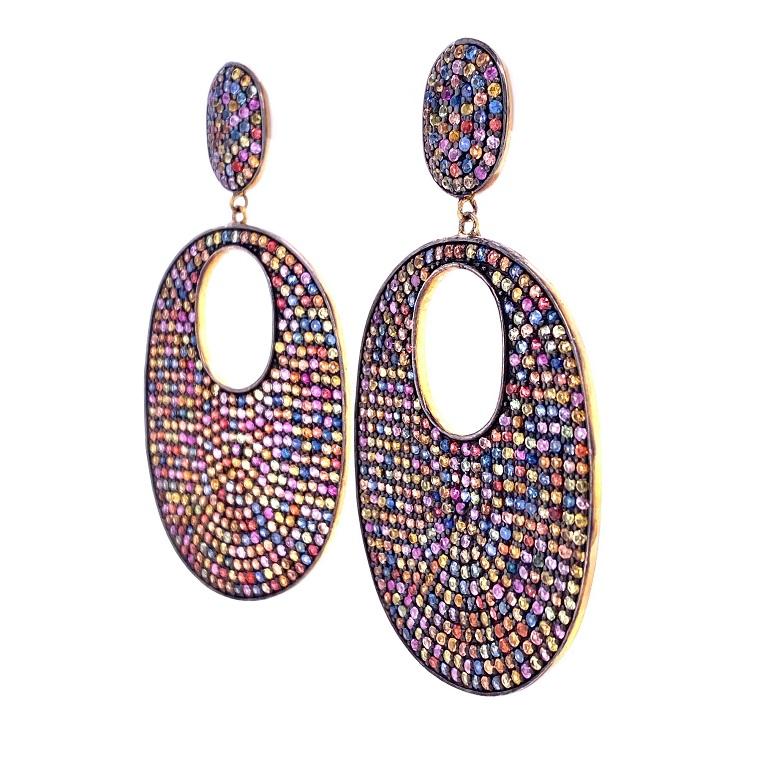 Life In Color Collection

Inclredibly bold multi colored Sapphire dangle earrings set in 14K gold plated sterling silver. 

Multi Colored Sapphire: 15.30ct total weight. 