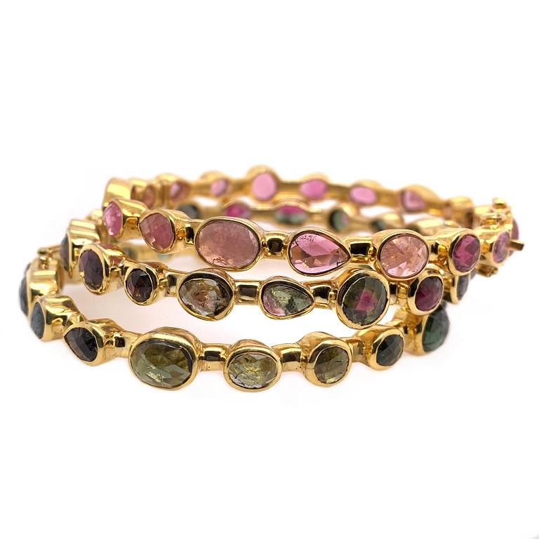 Life In Color Collection 

Fun stackable multi shape Tourmaline bangle set of three. A colorful combination of pink, green, and watermelon Tourmaline. Perfect for mixing and matching! Gold plated sterling silver. 
