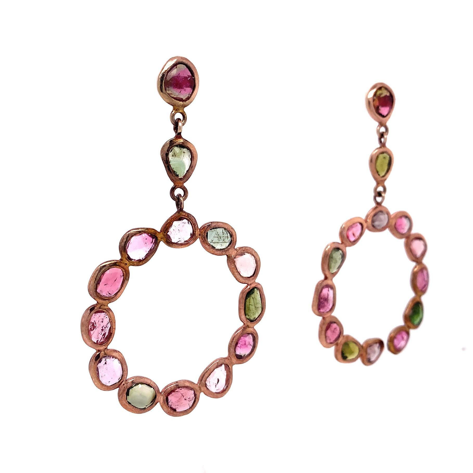 Life in color Collection

Multicolor Tourmaline wrapped in bezel rose gold plated featuring circle drop earring set in Sterling Silver.

Tourmaline: 14.92ct total weight.