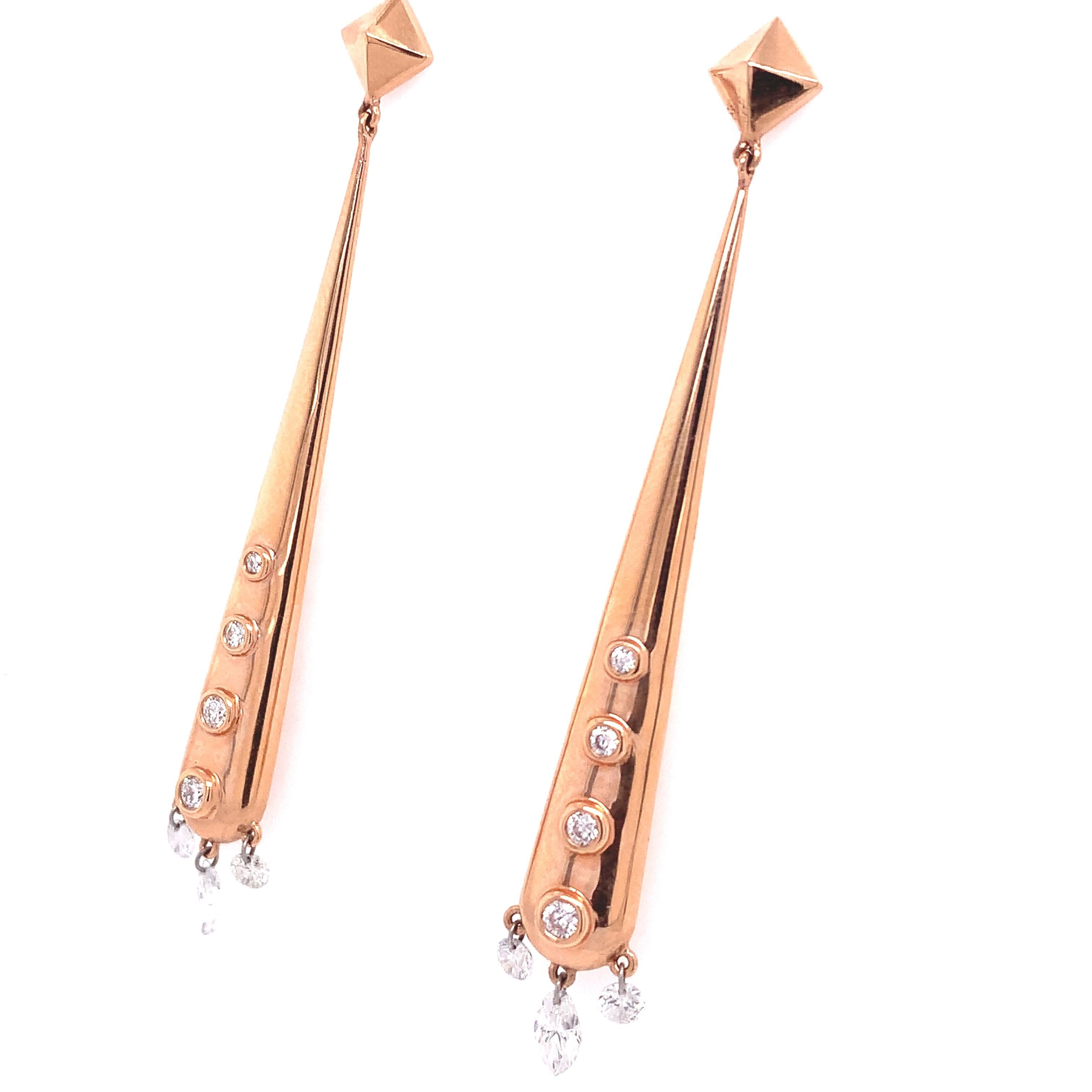 Dainty Collection

Rose Gold earrings sculpted to capture the alluring shape of the pyramid unleash the incomparable beauty 0.81 carat diamond stones 
