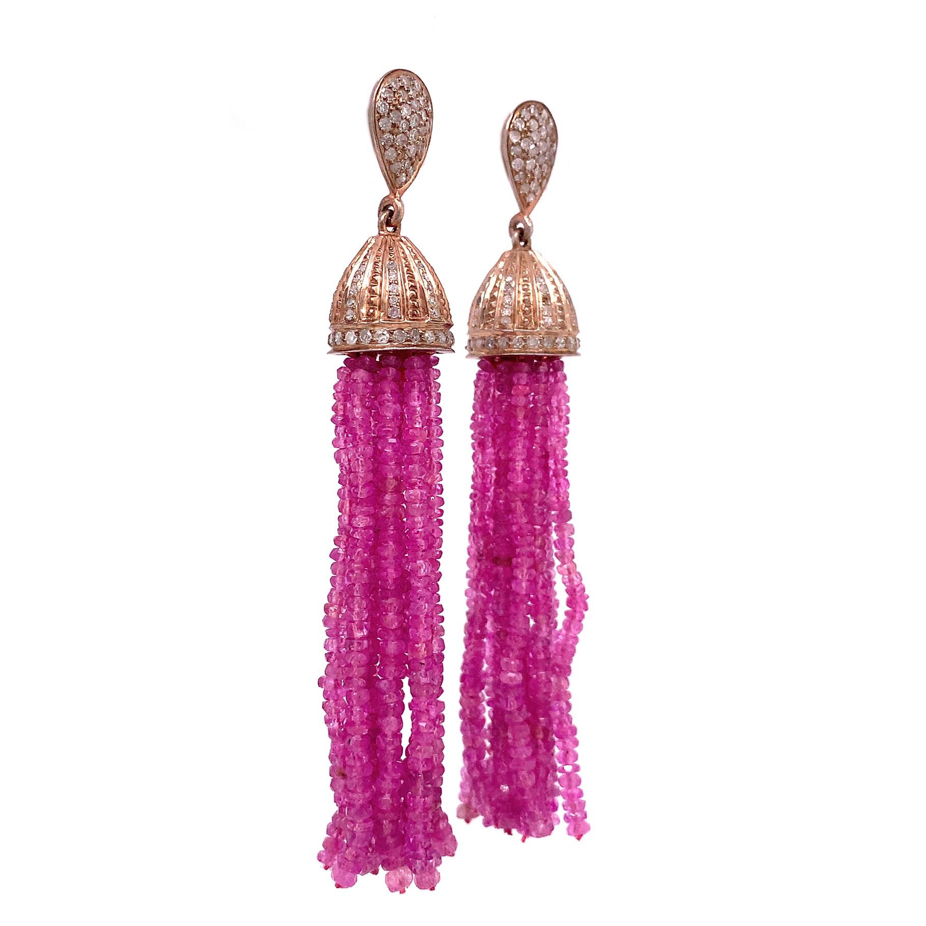 Life in color Collection

Pink Sapphire bead tassels with icy Diamonds set in pink colored Silver.

Pink Sapphire: 79.44ct total weight.
Diamond: 1.75ct total weight.

