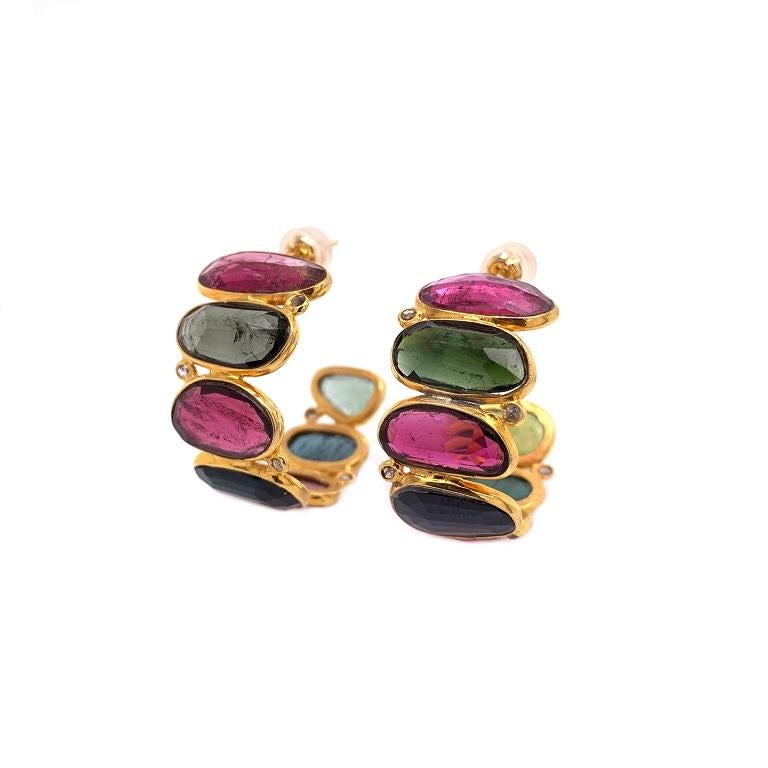 Life In Color Collection 

Rose cut oblong pink, green, and teal Tourmaline and Diamond hoop earrings set in solid 18K yellow gold. 1 inch, post back. 

Tourmaline: 25.56ct total weight.
Diamonds: 0.24ct total weight.