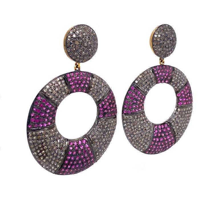 Rustic Collection 

Hot pink Rubies and rustic Diamond circle drop earrings set in sterling silver and 14K gold plating.

Rubies: 4.61ct total weight.
Diamonds: 14.72ct total weight.