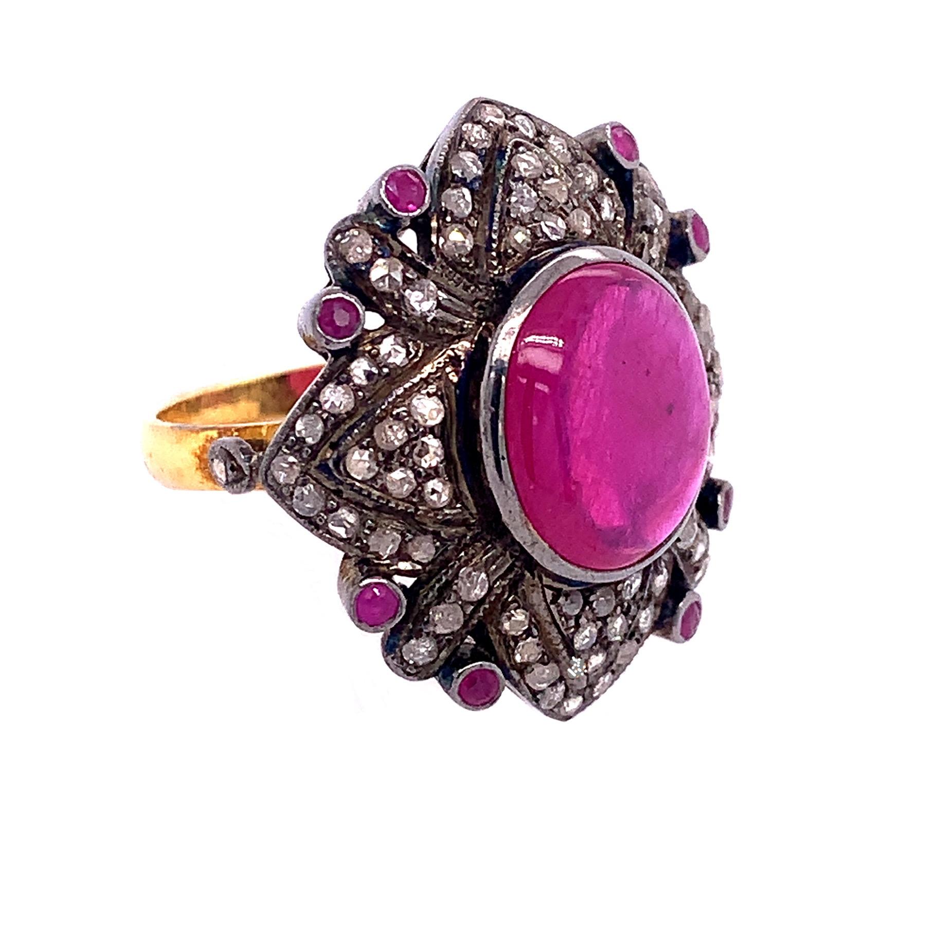 Life in color collection

Bright Passion Cabochon Ruby and diamonds cocktail ring set in sterling silver and yellow gold.

Ruby : 5.76ct total weight.
Diamond : 0.79ct total weight.
US size : 7.75
