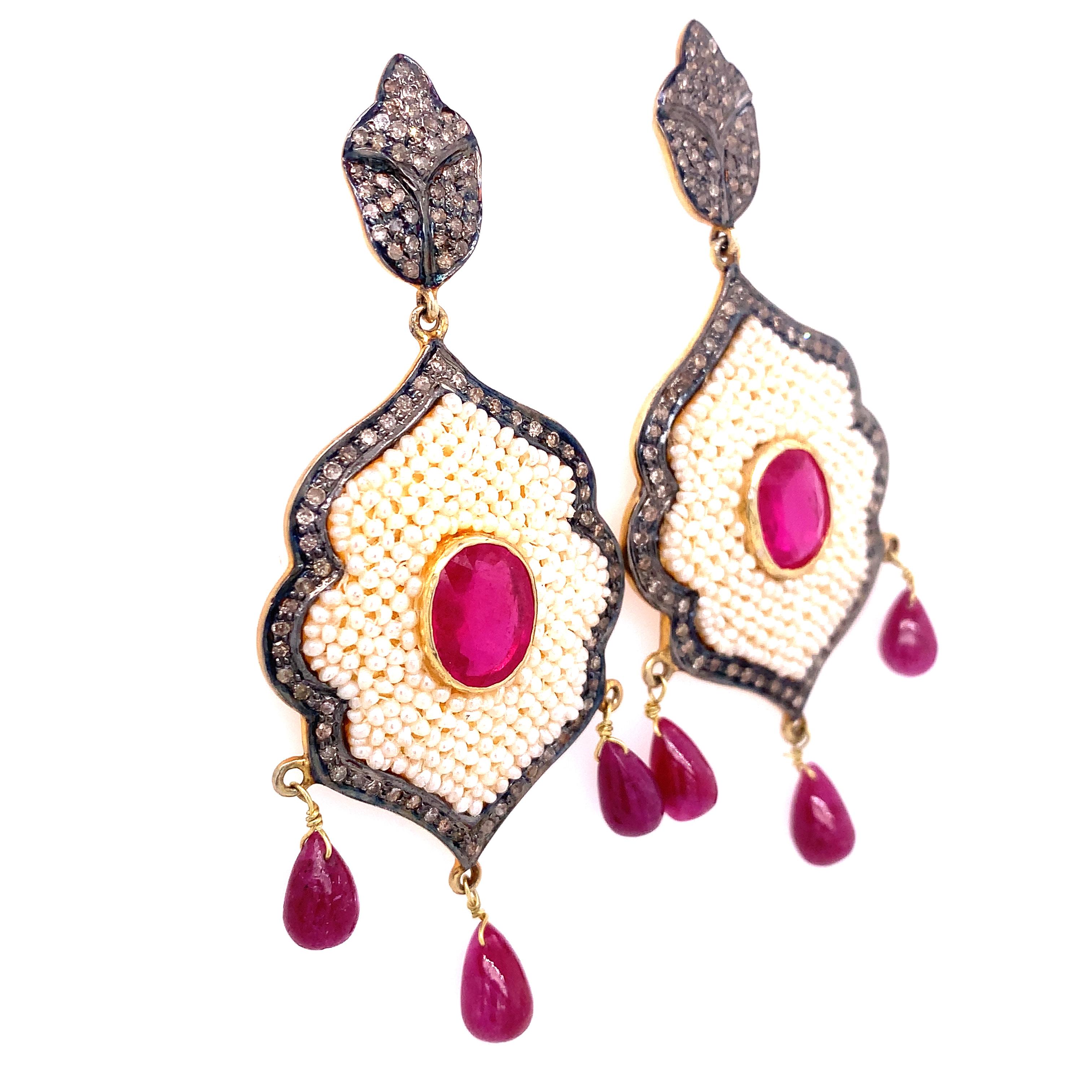 Rustic Collection 

Rustic Diamonds with Rubies and Seed Pearl chandelier earrings set in sterling silver and 14K gold plating. 

Ruby: 2.47ct total weight.
Diamonds: 1.62ct total weight.