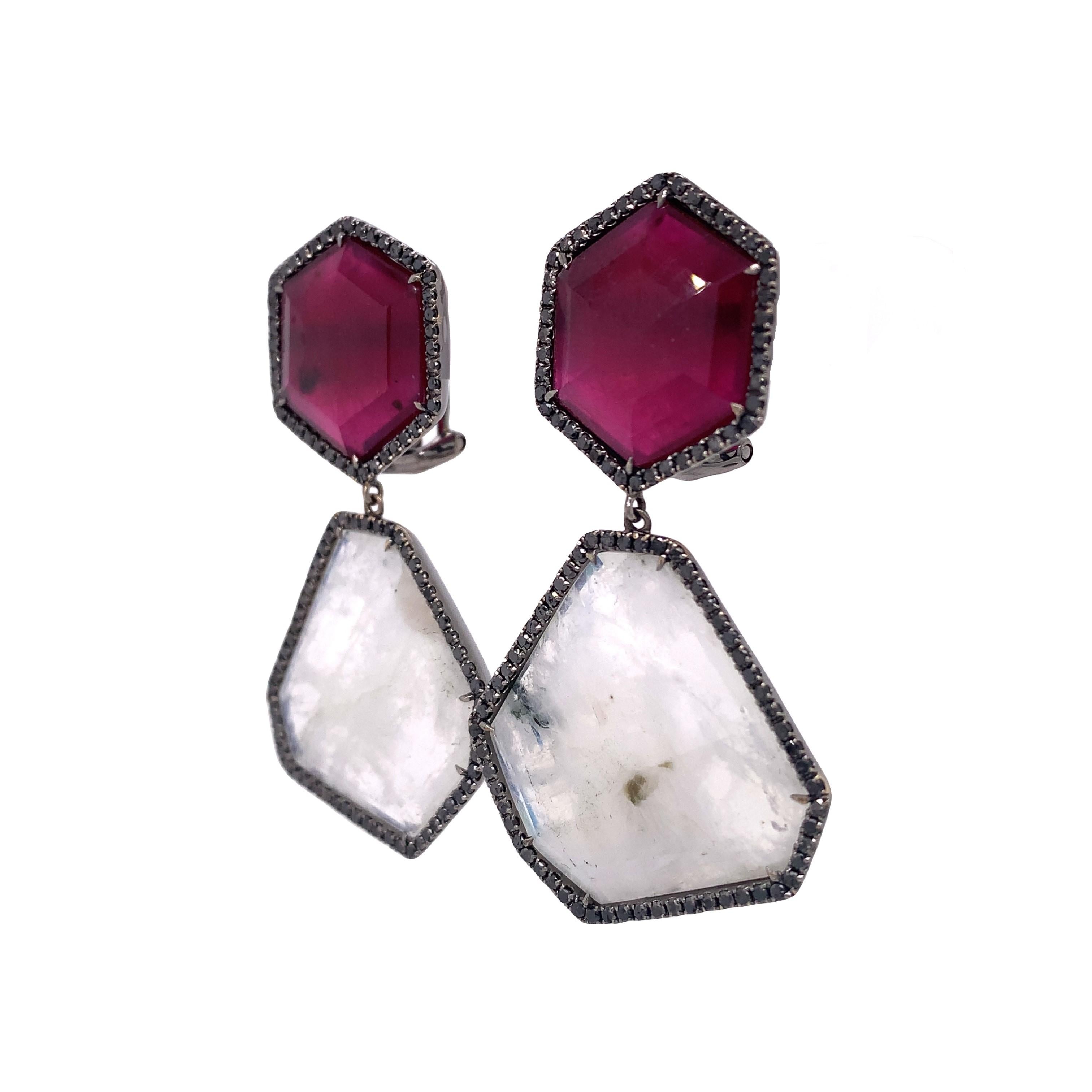 Lillipad Collection

Slice Ruby and Moonstone accented by Black Diamond with clip on drop earrings set in 18k black gold.

Ruby: 34.81ct total weight.
Moonstone: 27.14ct total weight.
Diamond: 1.68ct total weight.
All diamonds are G-H/SI stones.