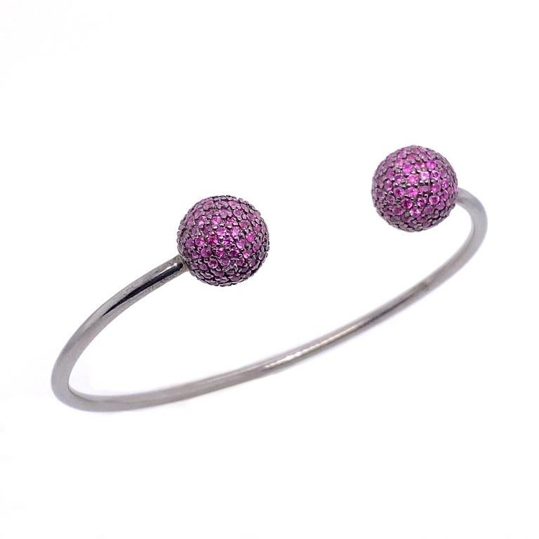Life in Color Collection 

Pave Ruby ball open bangle bracelet. Set in blackened sterling silver. 
