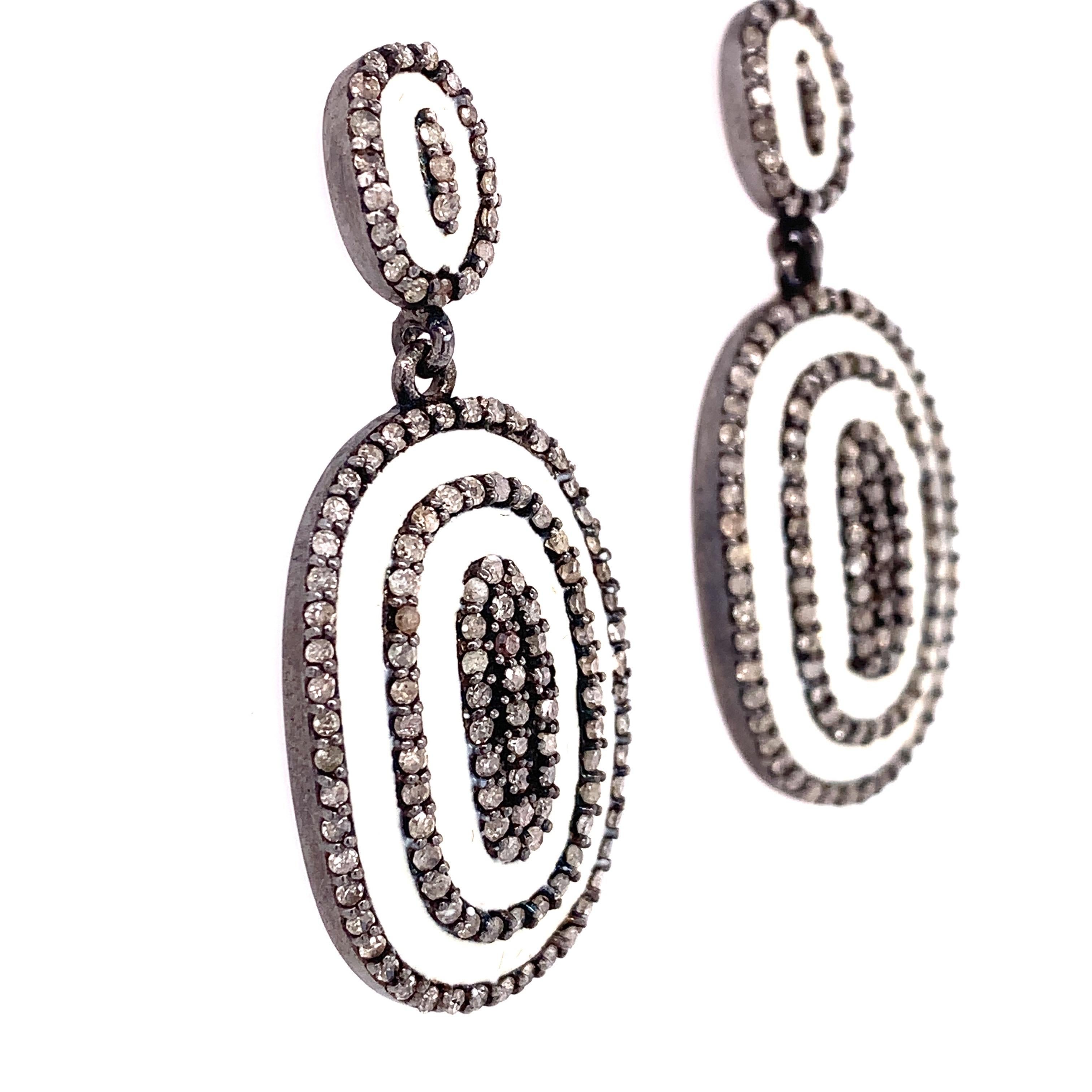 Rustic Collection

Oval Shape droop earrings with Rustic Diamonds and enamel set in blackened sterling silver.

Rustic Diamond:  2.60ct total weight.
