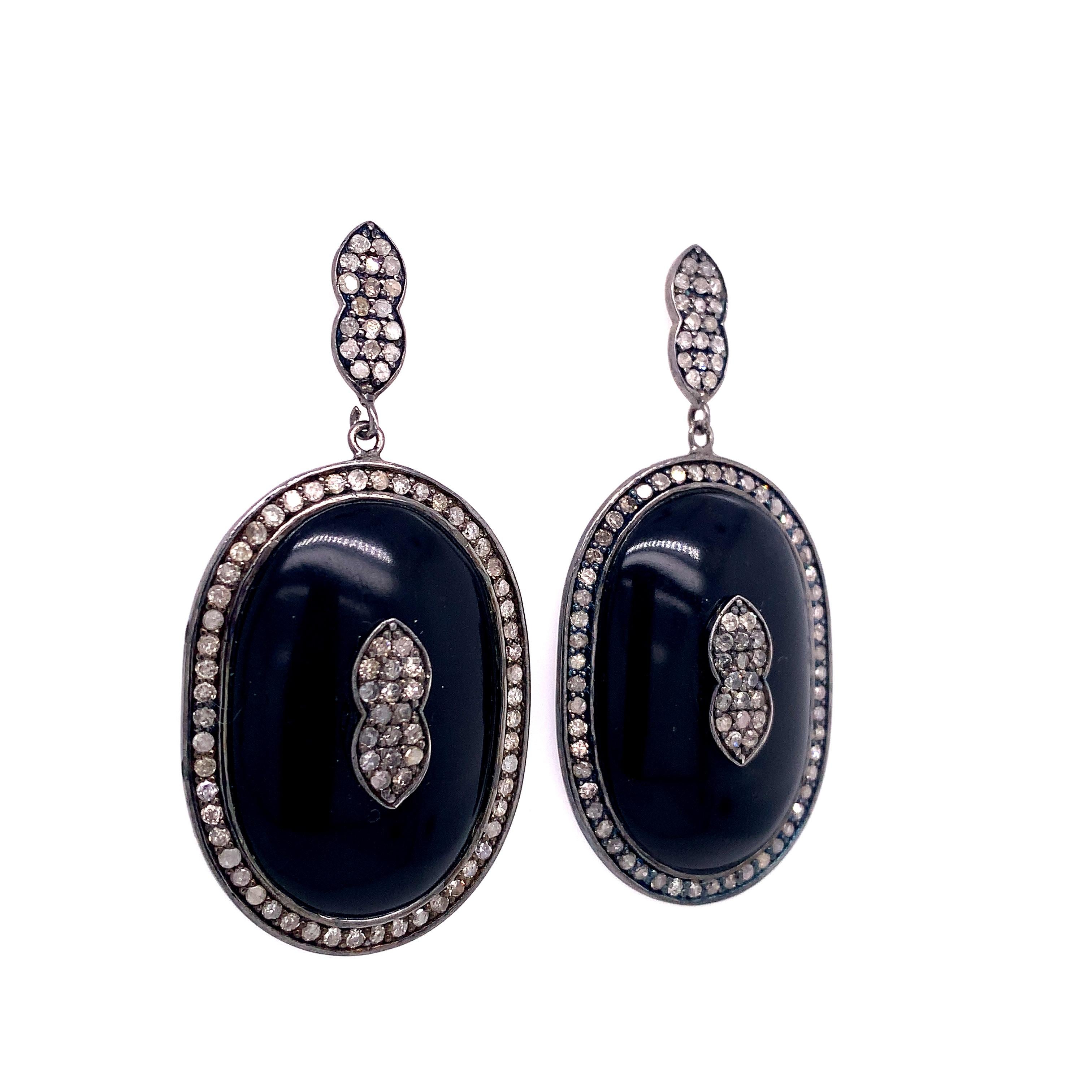 Rustic Collection 

Black Enamel with rustic Diamonds dangle earring set in blackened Sterling Silver.

Diamond: 2.10 ct total weight.
