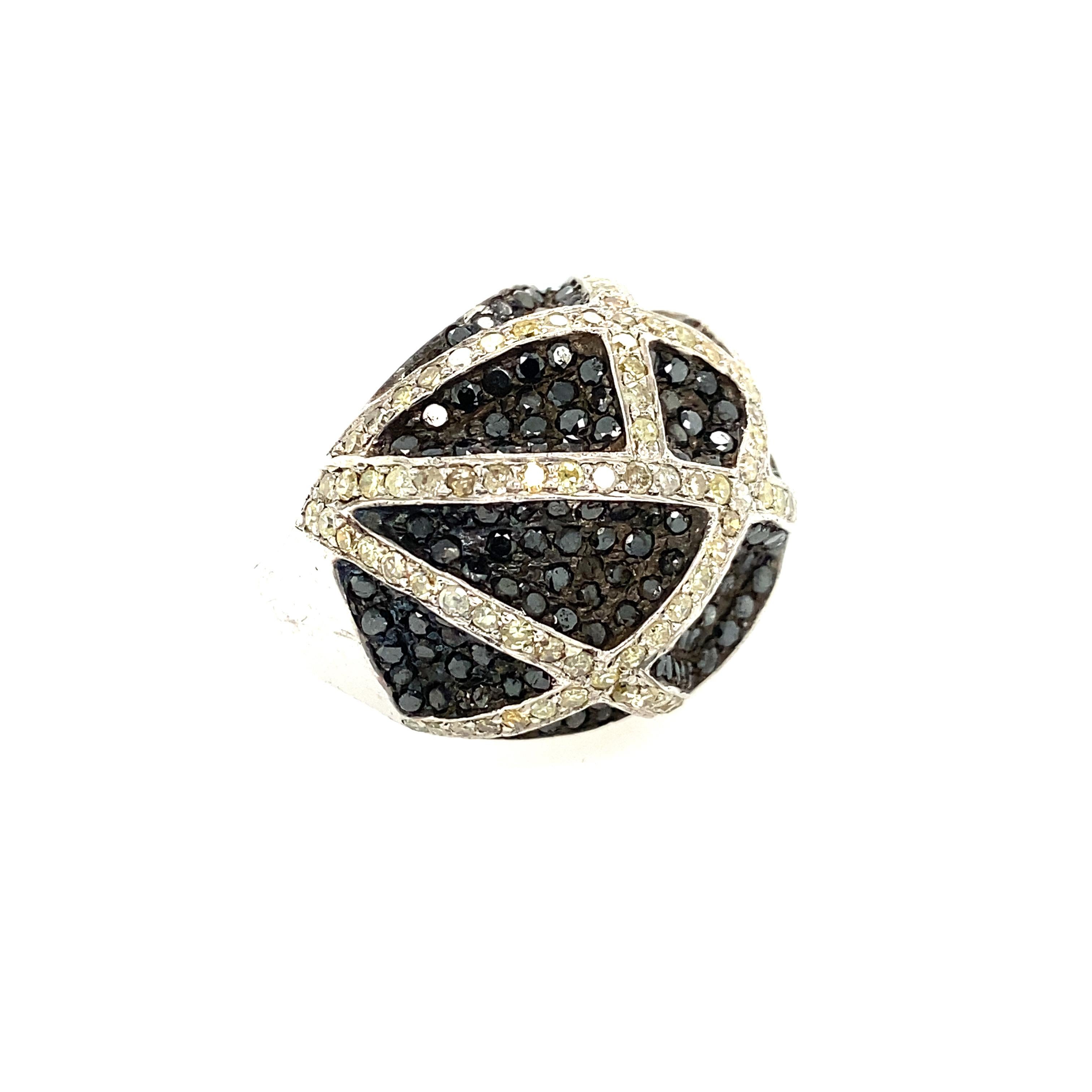 Rustic Collection

Rustic and black Diamond dome cocktail ring set in sterling silver. US size 7.5.

Diamond: 2.17ct total weight.
Black Diamond: 4.63ct total weight.