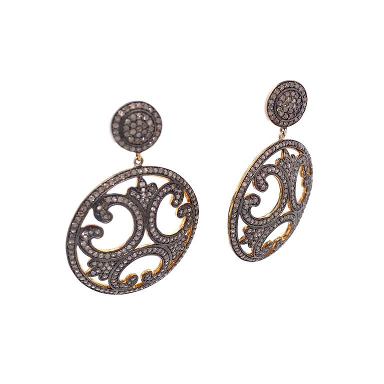 Rustic Collection

Geometric cut out pattern disc earrings with Rustic Diamonds set in sterling silver and 14K gold plating.

Diamonds: 3.82ct total weight. 