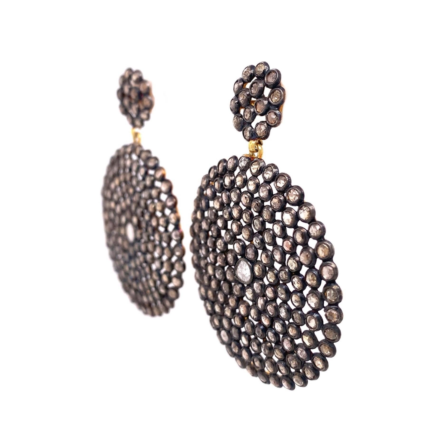 Rustic Collection 

Collection of bezel rose cut brown Diamonds set in a circle shape dangle earrings sterling Silver and 14K yellow gold plating.

Diamond: 20.31ct total weight.