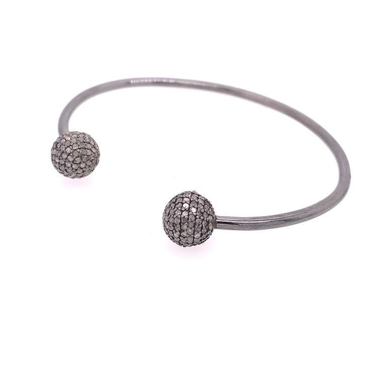 Rustic Collection

Rustic Diamonds ball open bangle bracelet. Set in blackened sterling silver. 

Diamonds: 2.52ct total weight.